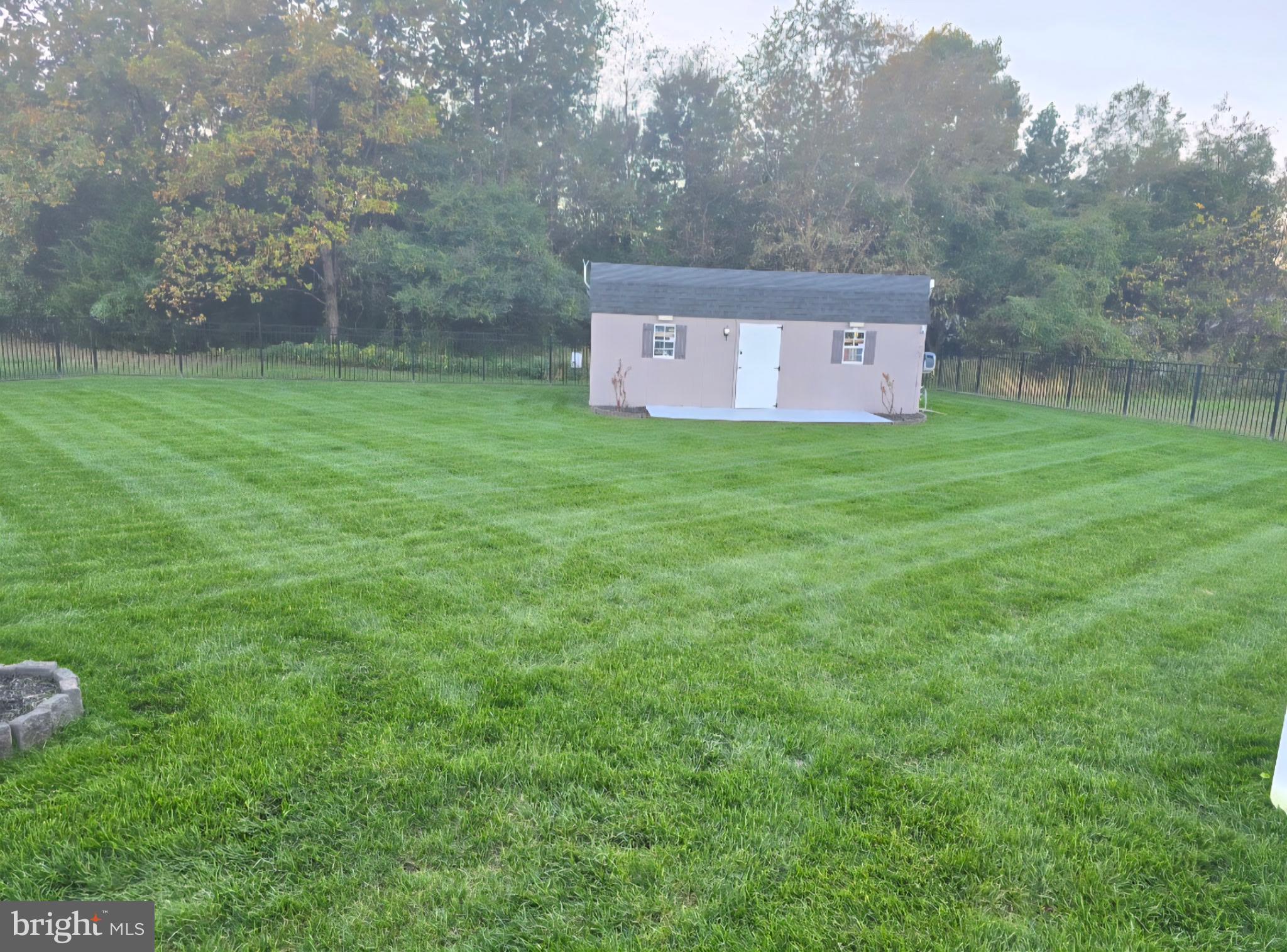 247 Cider Run Magnolia, DE 19962 - Photo 41 of 44 Backyard/Shed Srpingtime