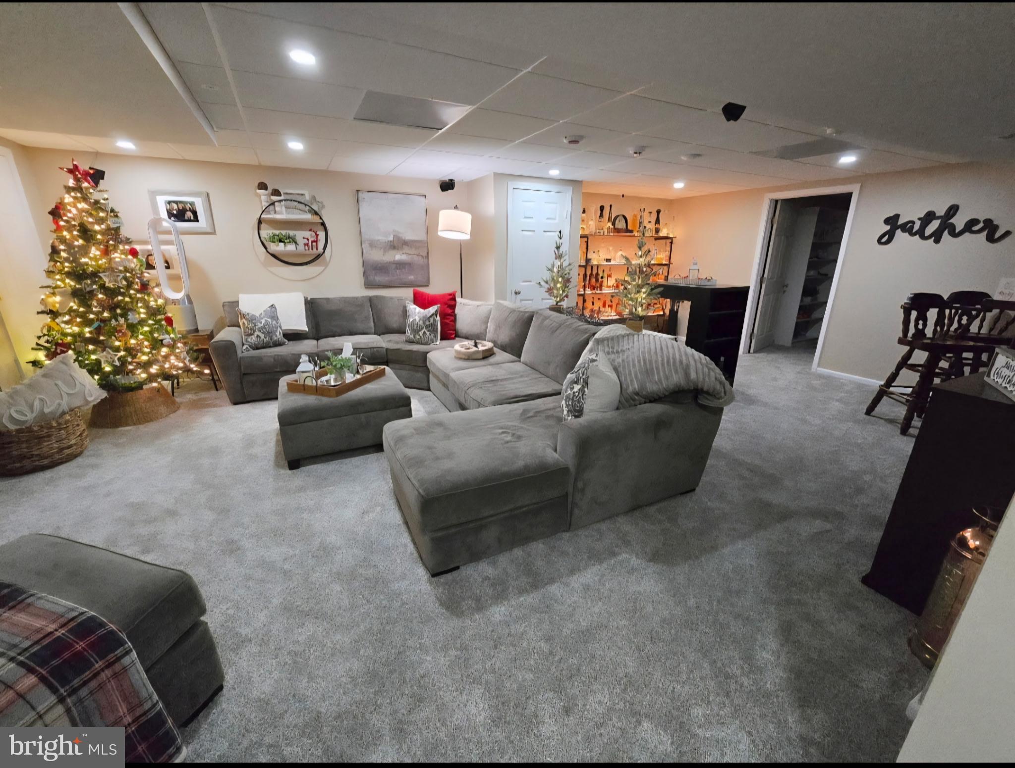 247 Cider Run Magnolia, DE 19962 - Photo 9 of 15 a living room with furniture and a chandelier