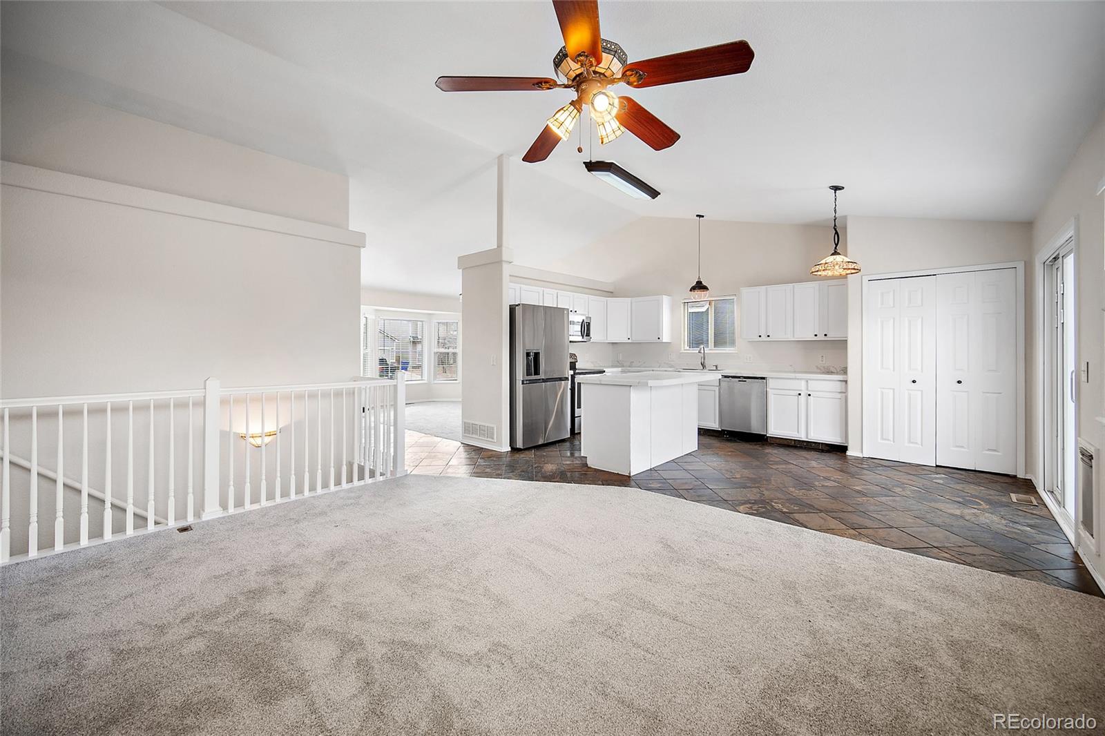 11360 Berry Farm Road Fountain, CO 80817 - Photo 18 of 44 a view of a kitchen with a sink and cabinet area