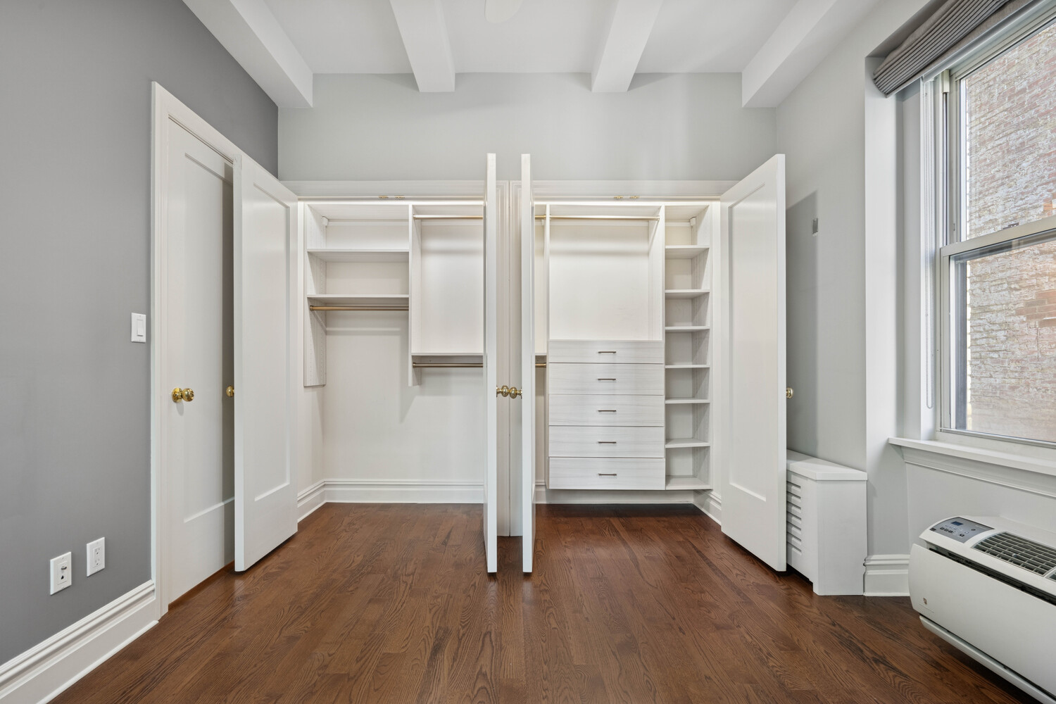25 5th Avenue, Unit 3G Manhattan, NY 10003 - Photo 5 of 9 wooden floor in an empty room with a window
