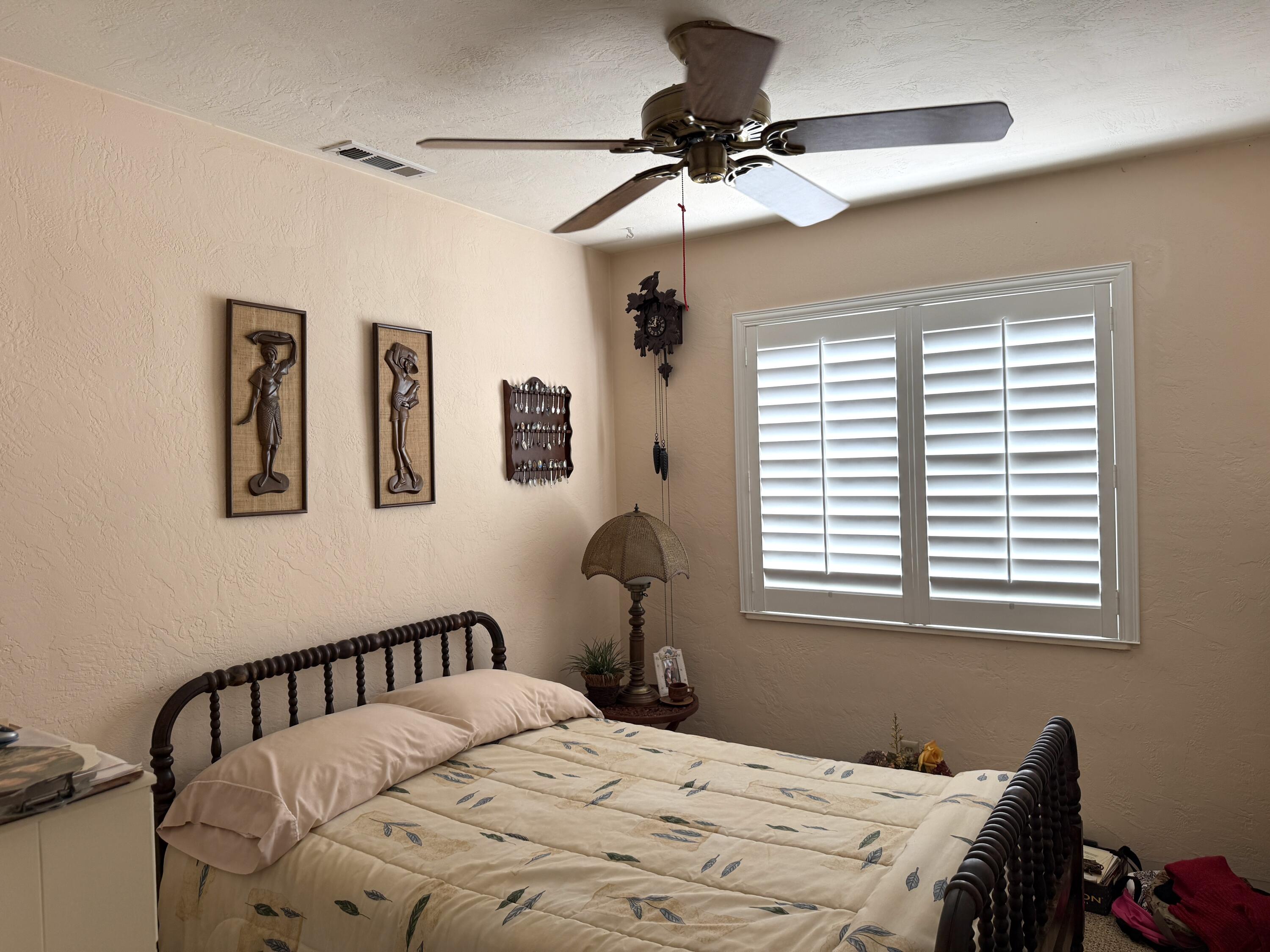 918 Parsons Drive Redding, CA 96002 - Photo 16 of 31 a bedroom with a bed and a window