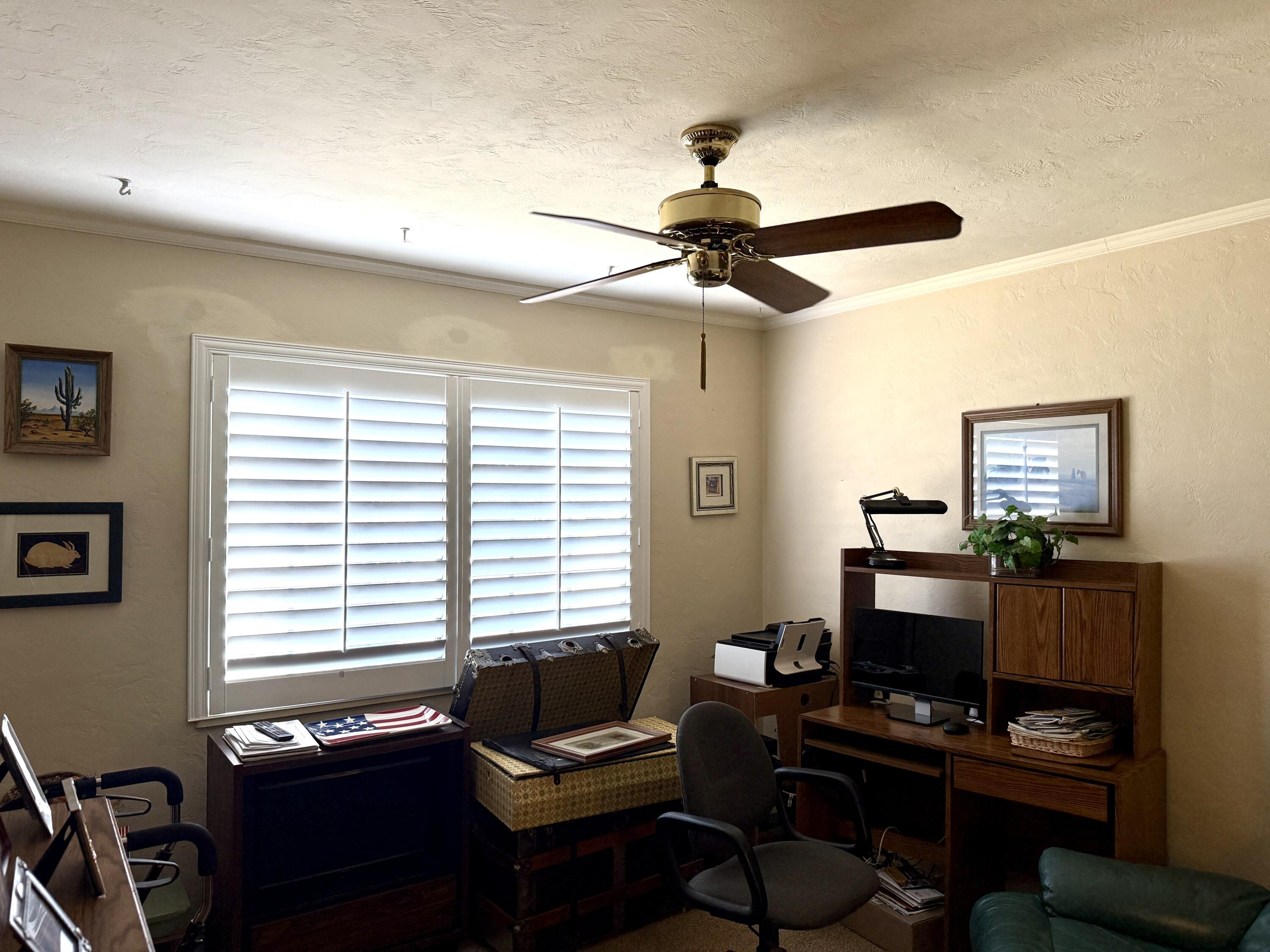 918 Parsons Drive Redding, CA 96002 - Photo 18 of 31 a workspace with furniture and a window