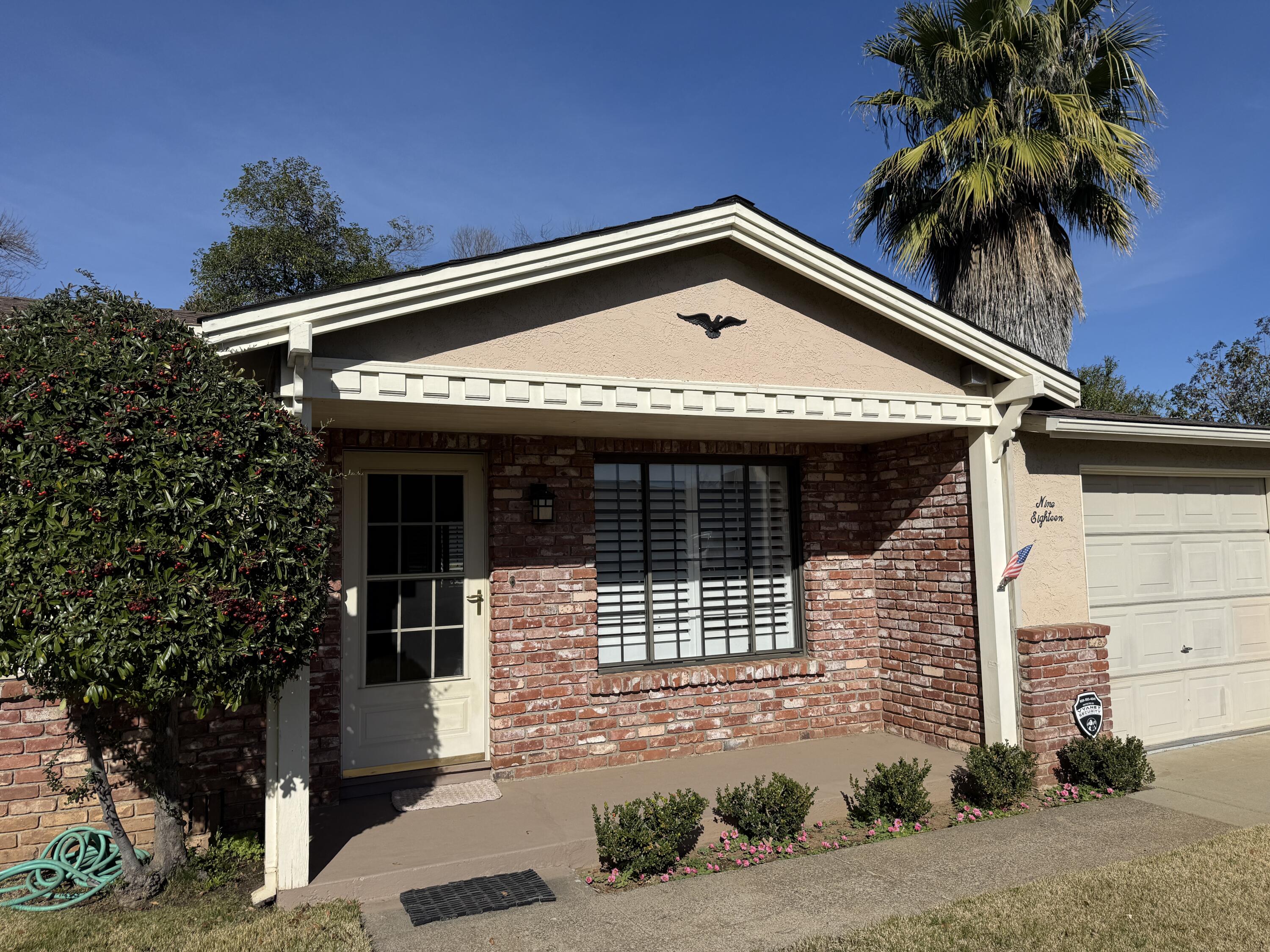 918 Parsons Drive Redding, CA 96002 - Photo 2 of 31 a front view of a house with a yard