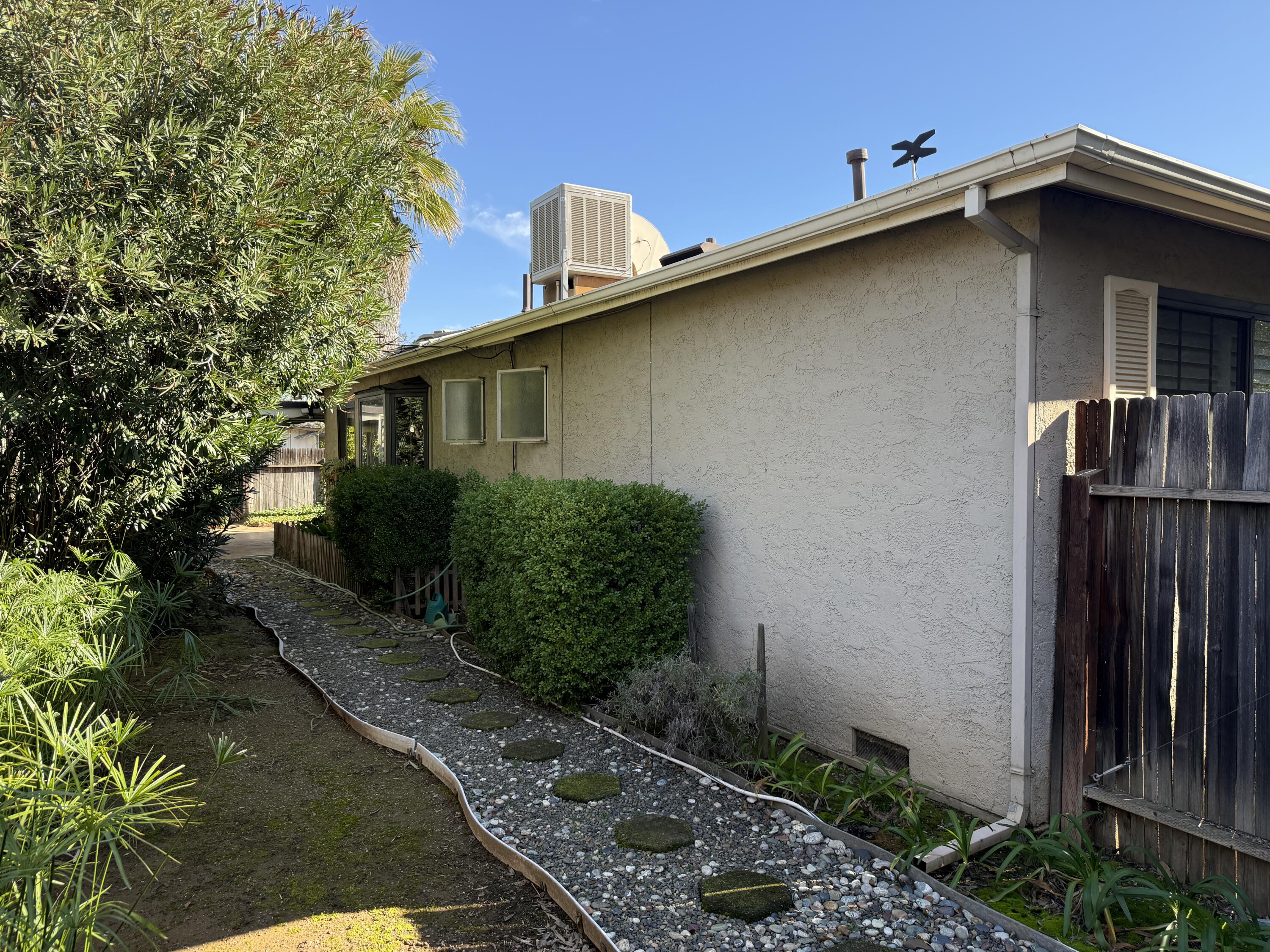 918 Parsons Drive Redding, CA 96002 - Photo 22 of 31 a house with trees in the background