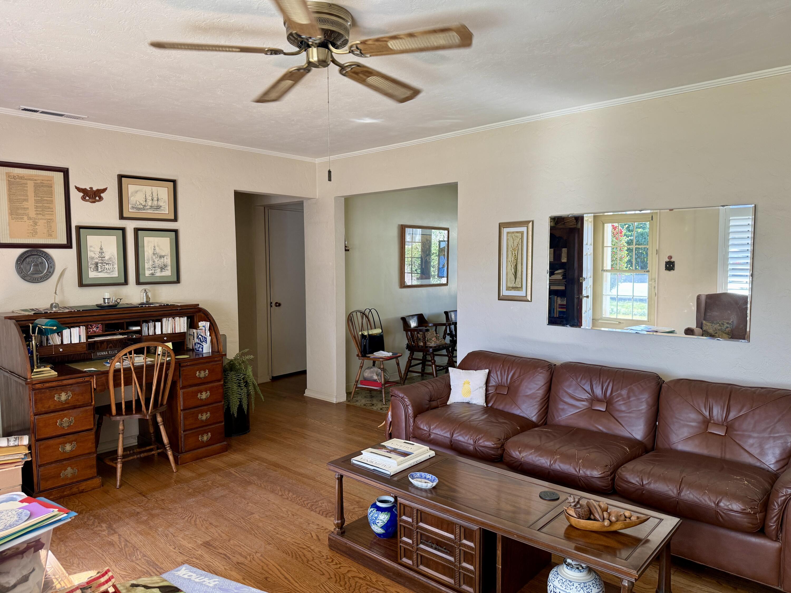 918 Parsons Drive Redding, CA 96002 - Photo 6 of 31 a living room with furniture and wooden floor
