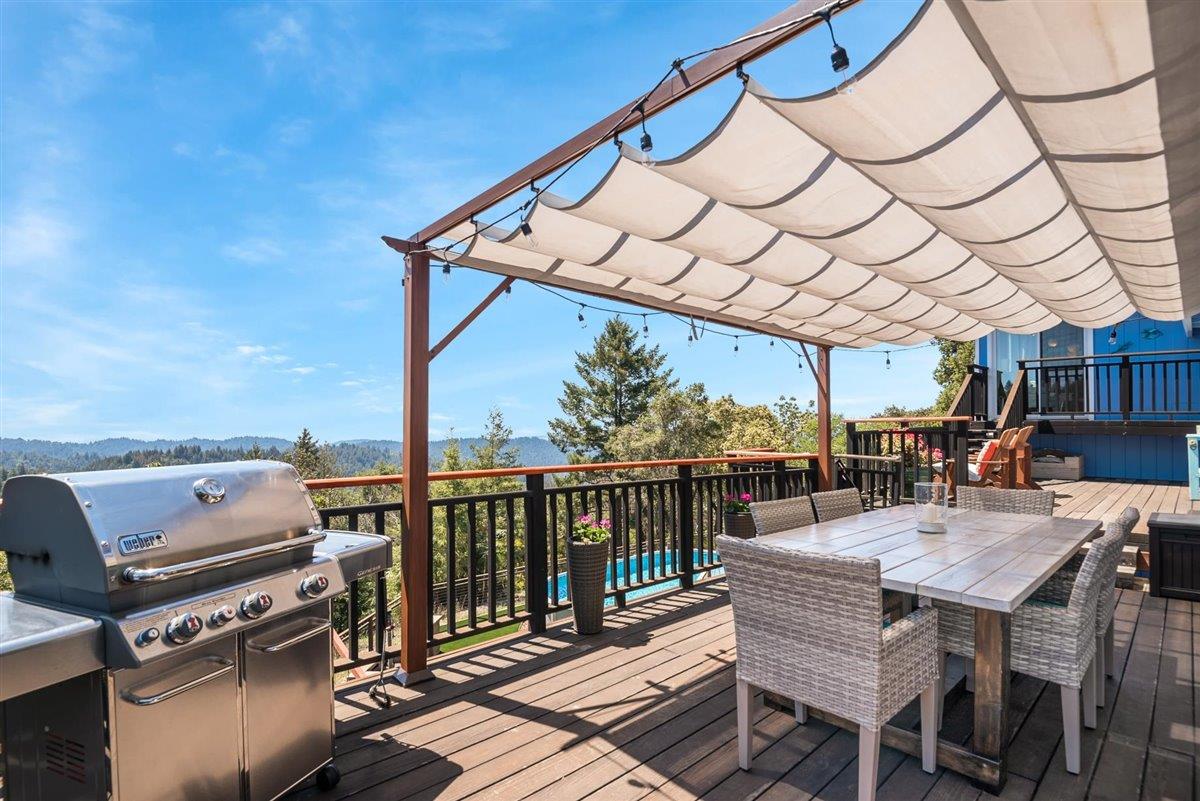 16300 Old Ranch Road Los Gatos, CA 95033 - Photo 19 of 26 a patio with glass top table and chairs