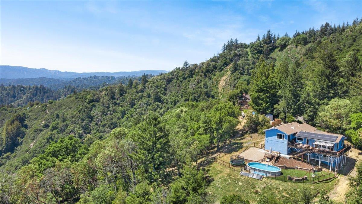 16300 Old Ranch Road Los Gatos, CA 95033 - Photo 23 of 26 an aerial view of a house with a yard