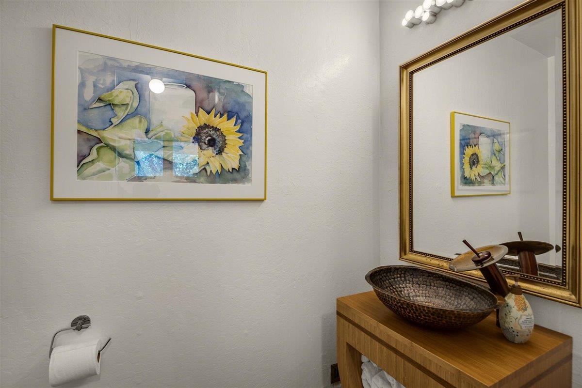 16300 Old Ranch Road Los Gatos, CA 95033 - Photo 8 of 26 a room with furniture and wall paintings