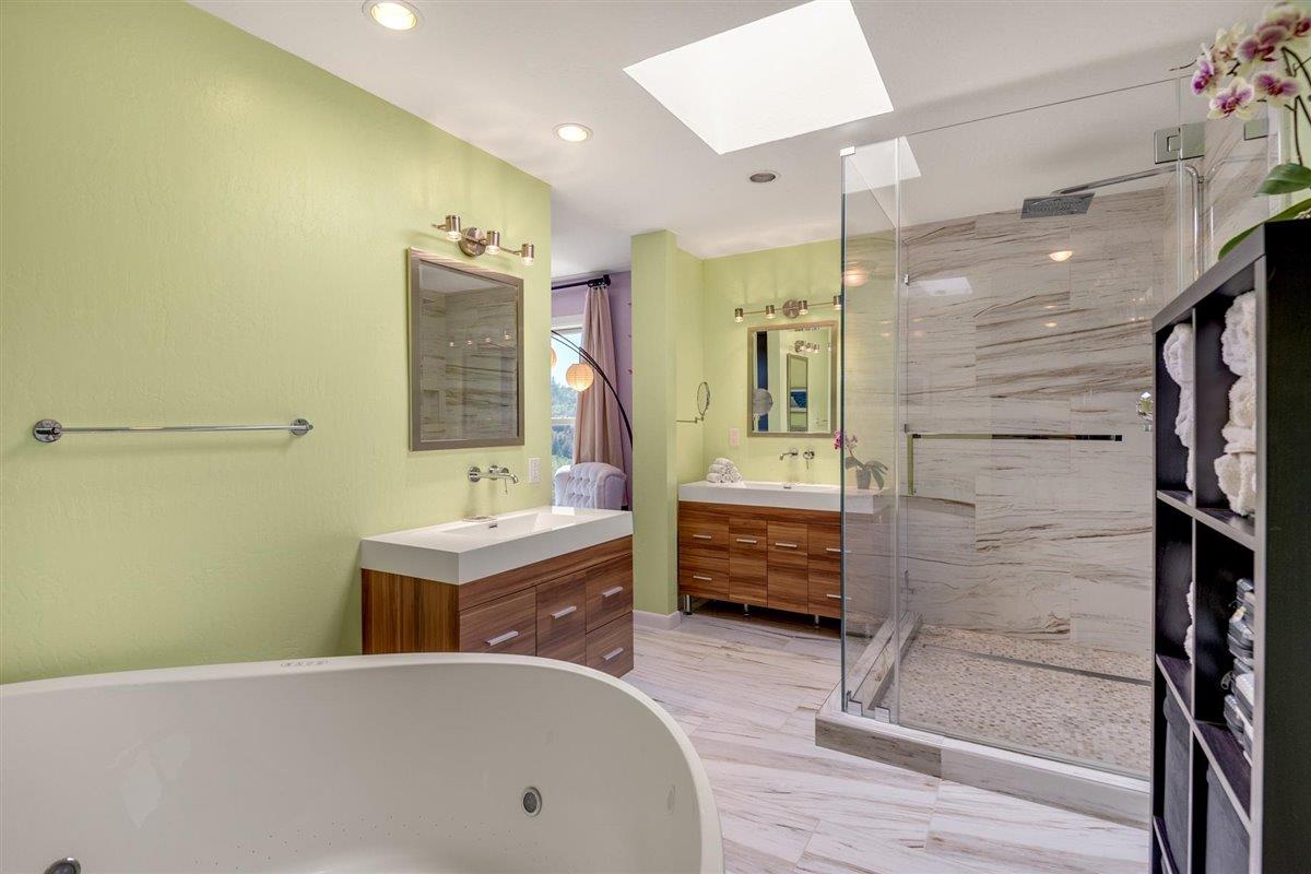 16300 Old Ranch Road Los Gatos, CA 95033 - Photo 10 of 26 a bathroom with a tub sink shower and mirror