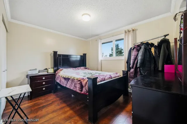 a bedroom with a bed and a closet