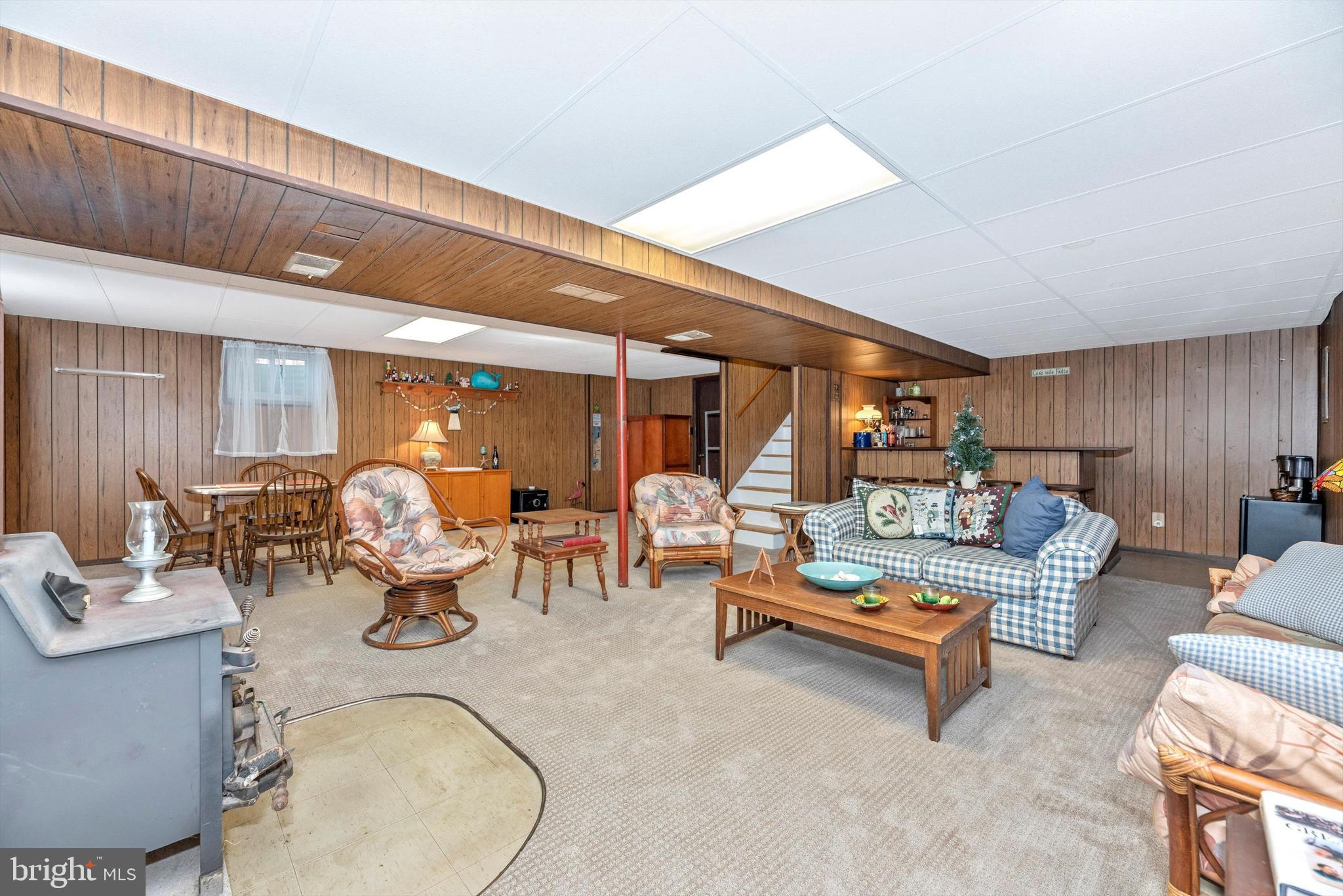 5416 Ridge Road Mount Airy, MD 21771 - Photo 22 of 33 Huge Recreation Room with Wood Stove and Bar