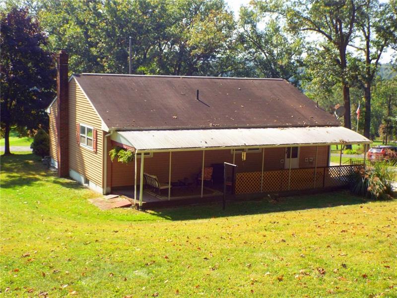 447 Harvey Road Foxburg, PA 16036 - Photo 16 of 23 Photo of the rear of the home showing the covered patio.