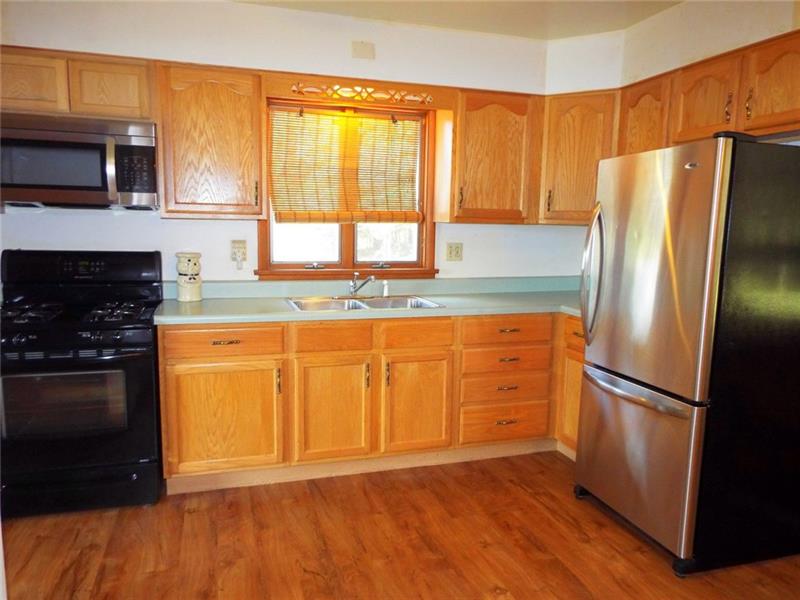 447 Harvey Road Foxburg, PA 16036 - Photo 3 of 23 Beautiful updated kitchen. Appliances included! Real hardwood flooring throughout.
