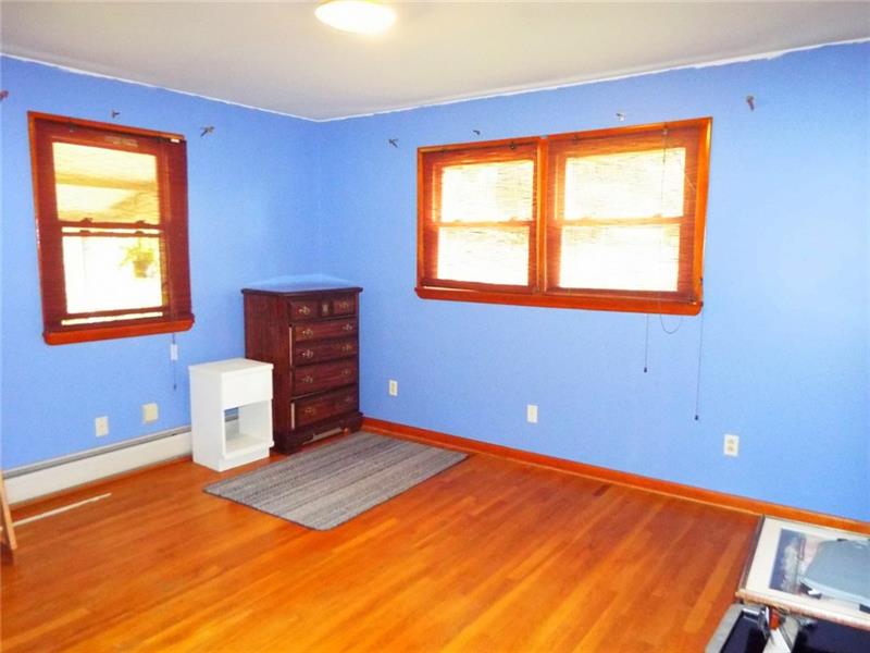 447 Harvey Road Foxburg, PA 16036 - Photo 10 of 23 Bedroom with multiple windows for natural light.