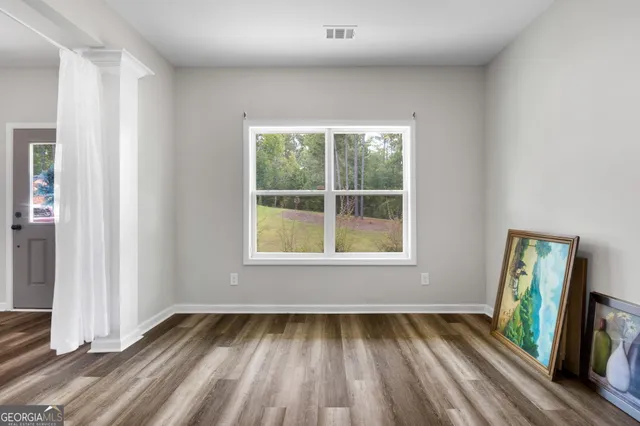 an empty room with window