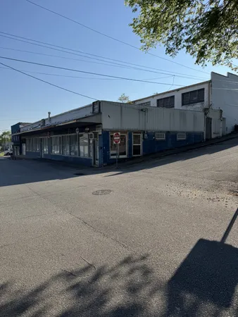 a view of a house with a street