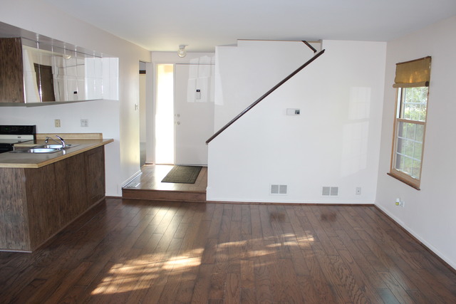 704 Wakefield Road Gurnee, IL 60031 - Photo 4 of 20 a view of a kitchen with a sink and a window