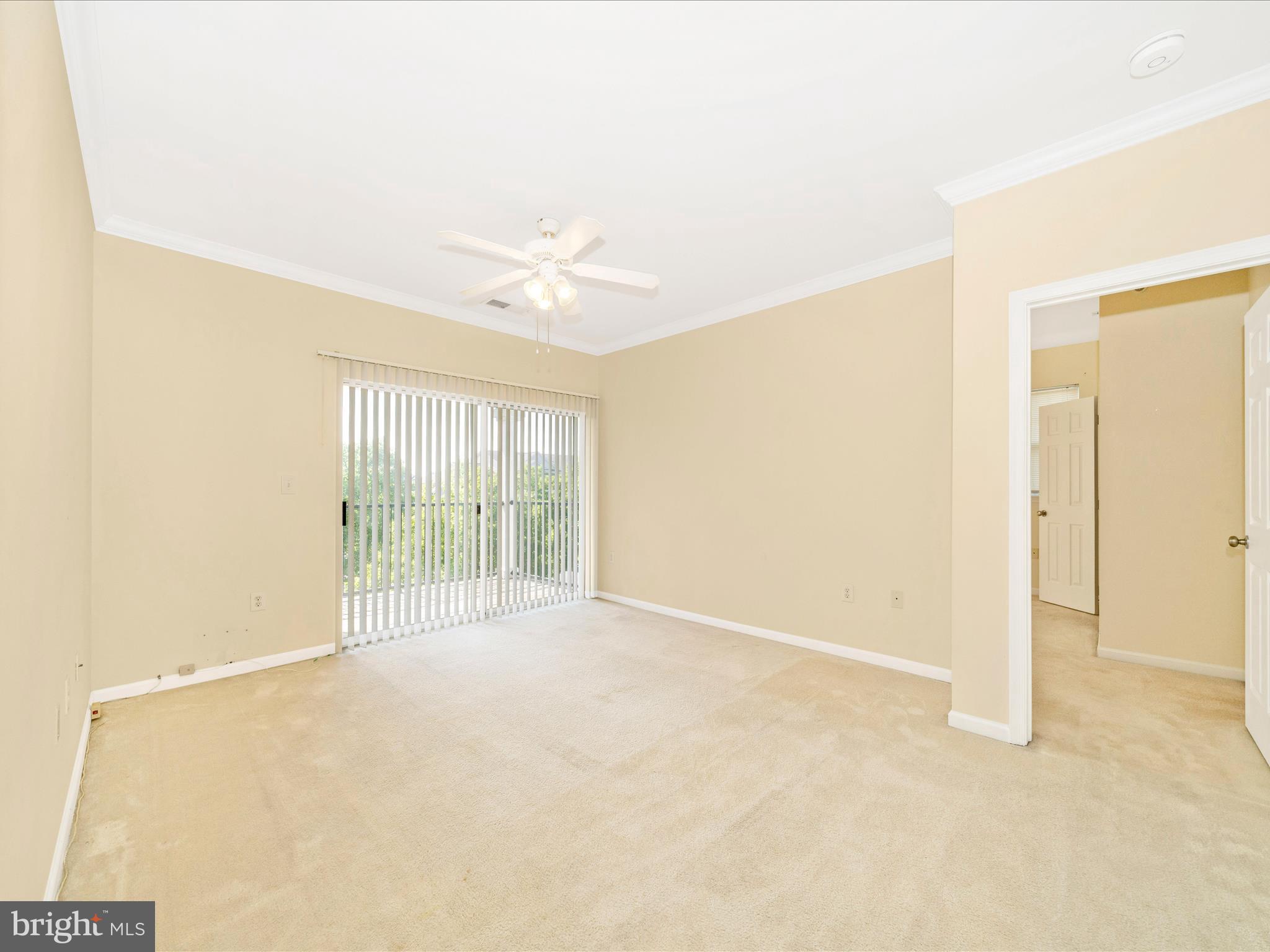 19606 Galway Bay Circle, Unit 401 Germantown, MD 20874 - Photo 17 of 50 a view of an empty room with a window