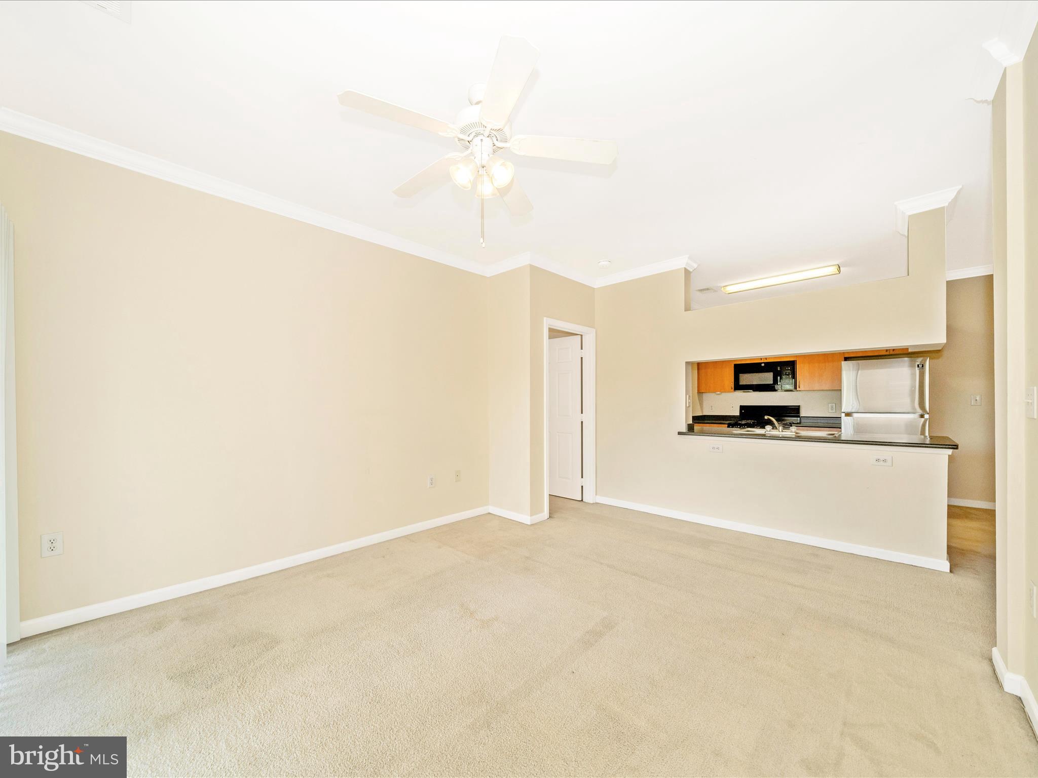 19606 Galway Bay Circle, Unit 401 Germantown, MD 20874 - Photo 21 of 50 a view of a kitchen with a sink