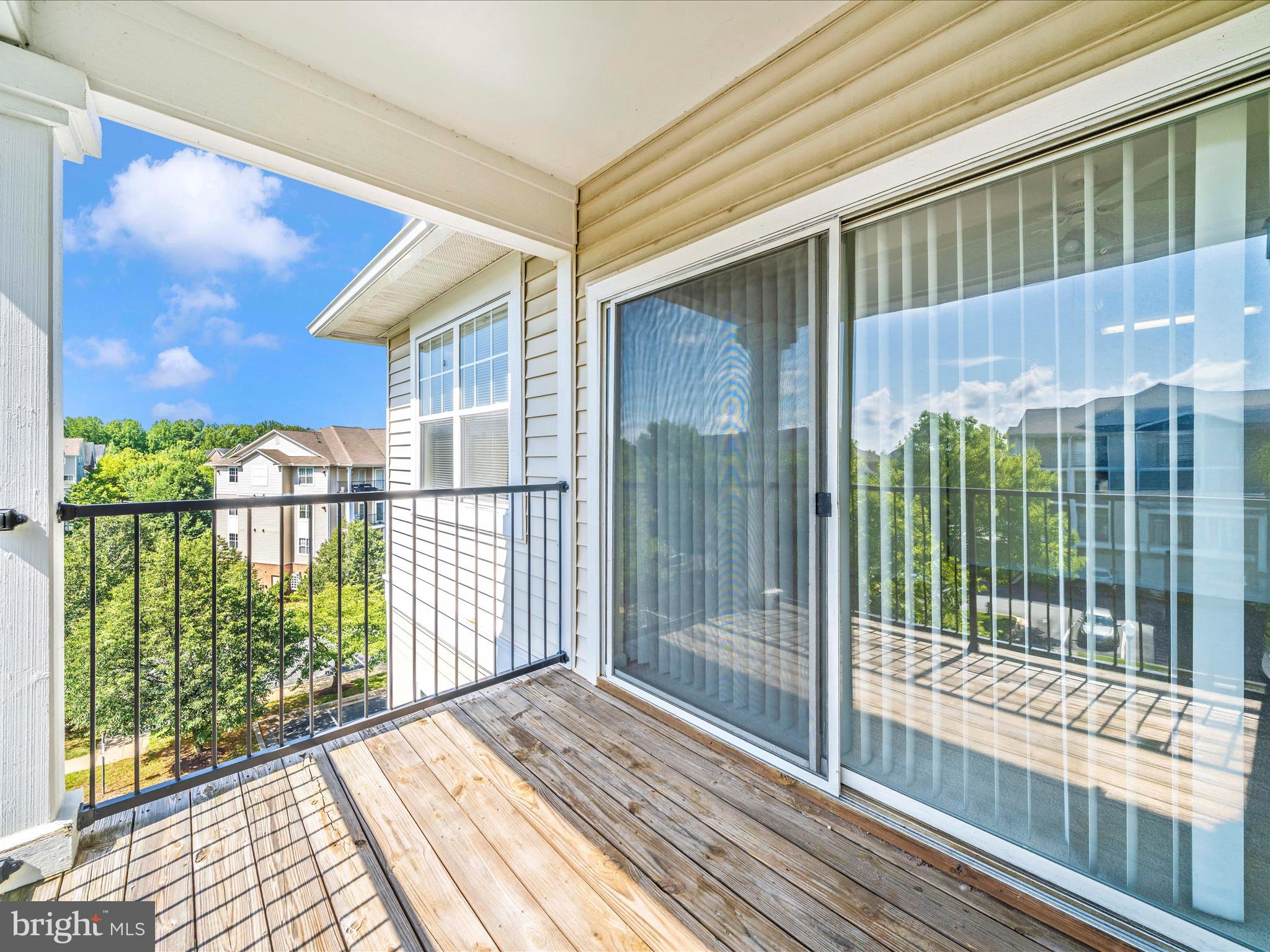 19606 Galway Bay Circle, Unit 401 Germantown, MD 20874 - Photo 38 of 50 a view of a house with a balcony