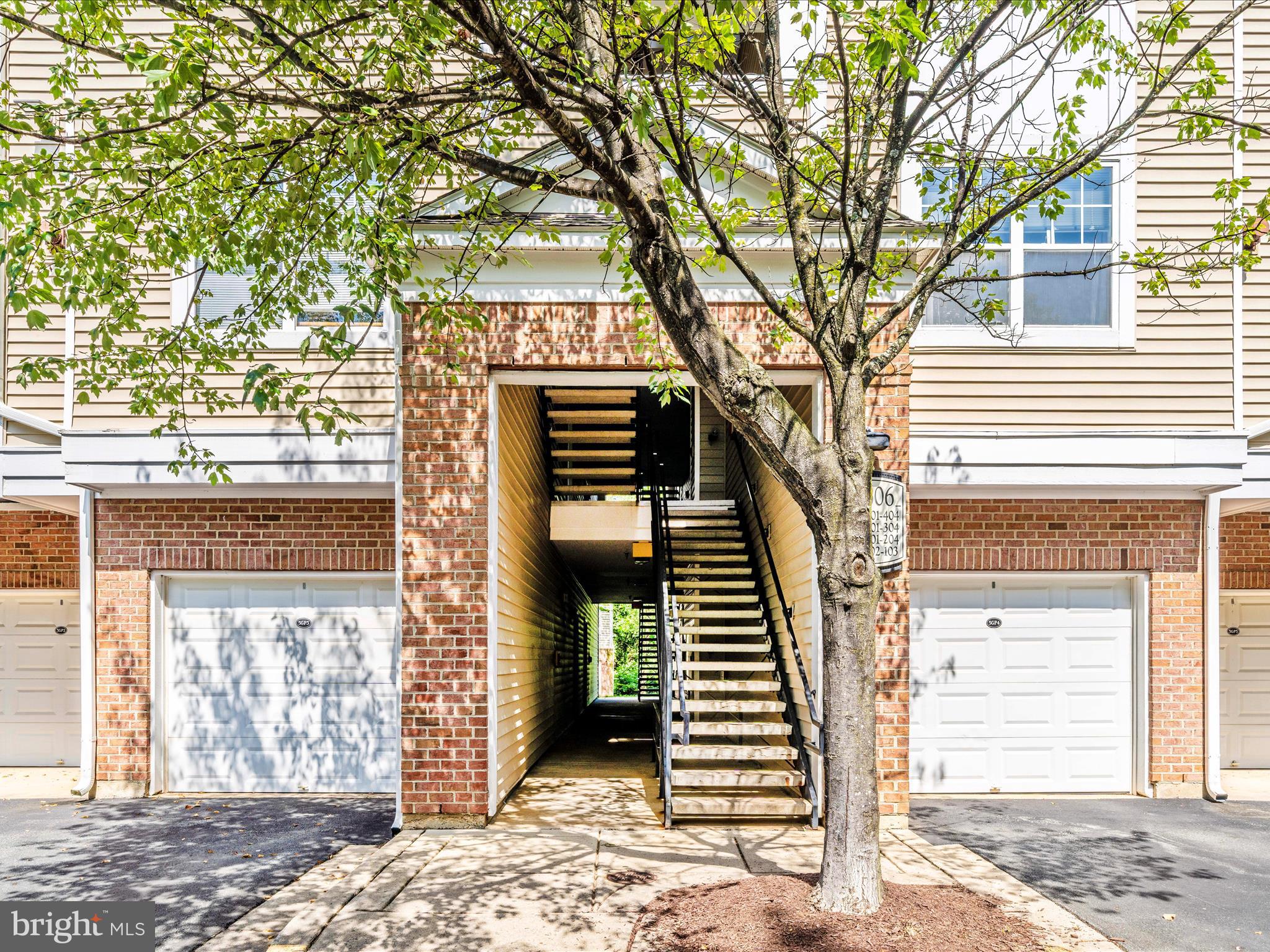 19606 Galway Bay Circle, Unit 401 Germantown, MD 20874 - Photo 45 of 50 a front view of a house with stairs