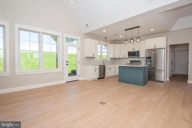 a bathroom with a sink double vanity and a mirror