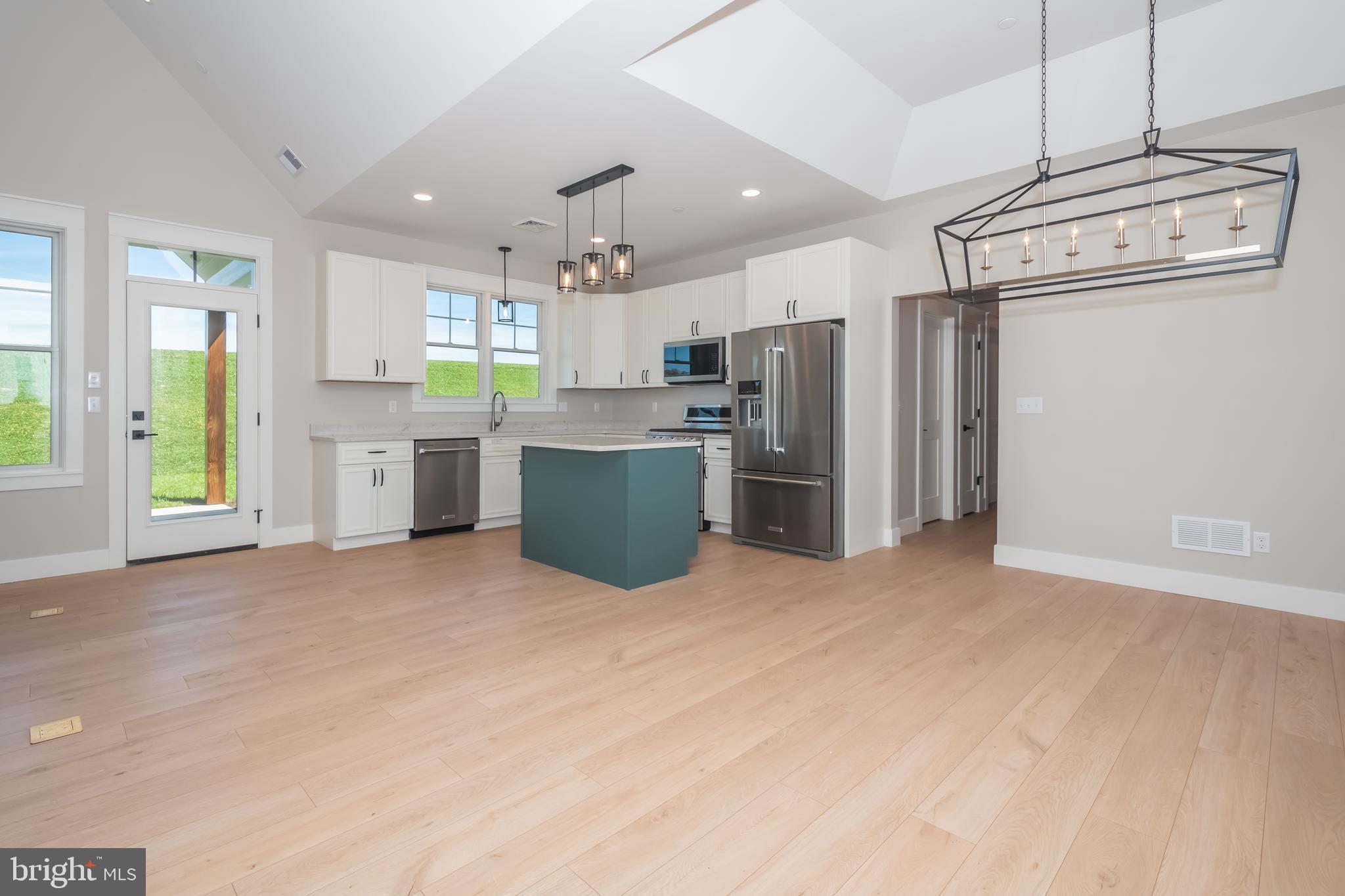 71 Walnut Ridge Grantsville, MD 21536 - Photo 19 of 55 a kitchen with stainless steel appliances a refrigerator a sink dishwasher stove and oven