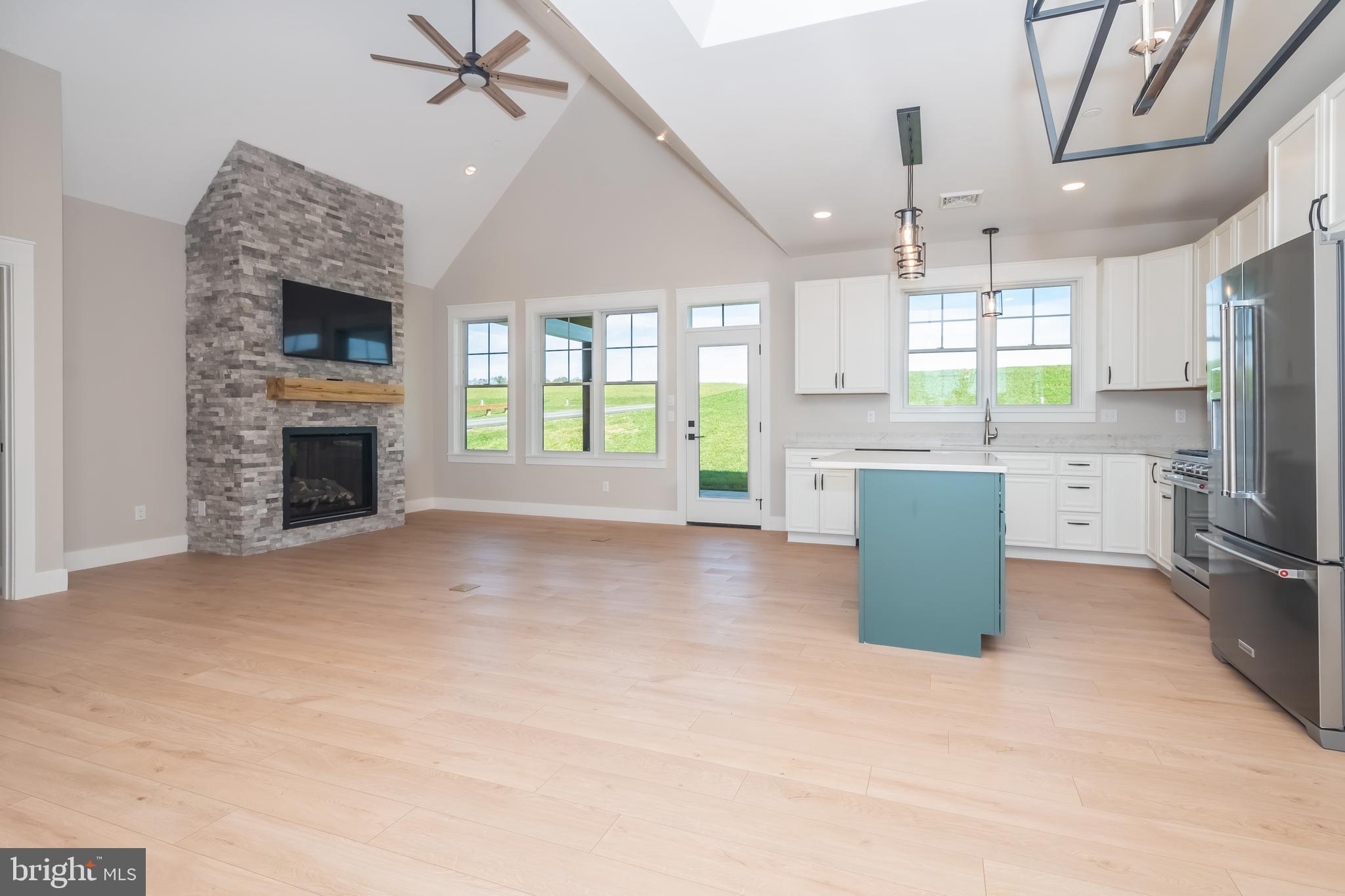 71 Walnut Ridge Grantsville, MD 21536 - Photo 25 of 55 a view of a kitchen with furniture and a fireplace