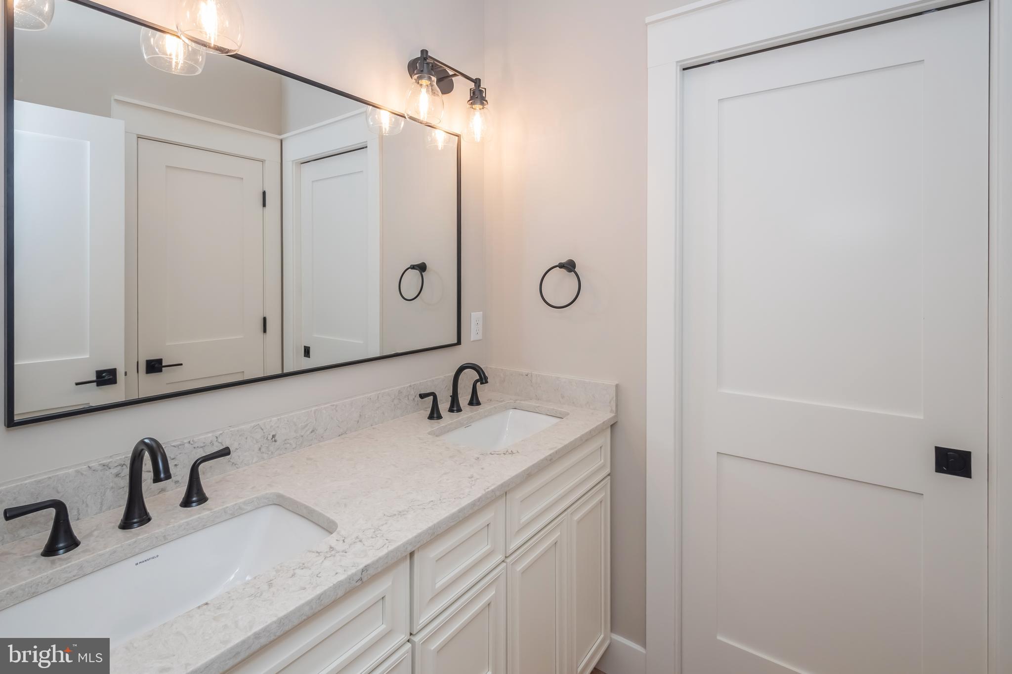 71 Walnut Ridge Grantsville, MD 21536 - Photo 36 of 55 a bathroom with a sink and a mirror
