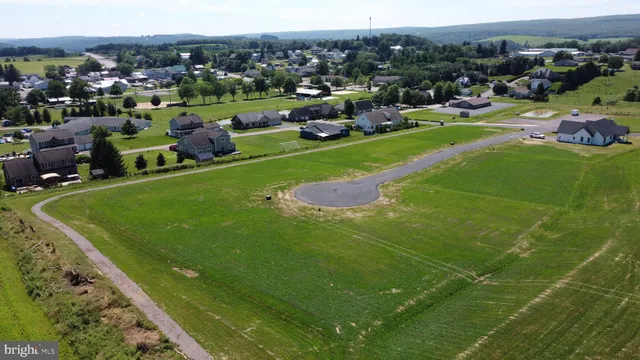 a view of a stadium that has a big yard