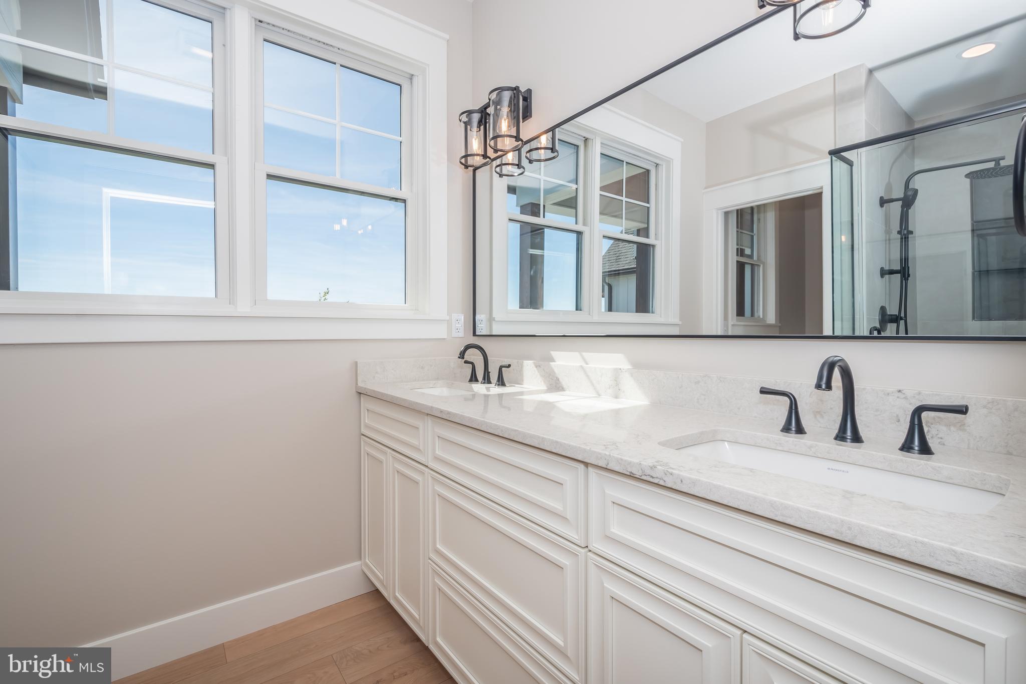 71 Walnut Ridge Grantsville, MD 21536 - Photo 46 of 55 a bathroom with a sink and a mirror