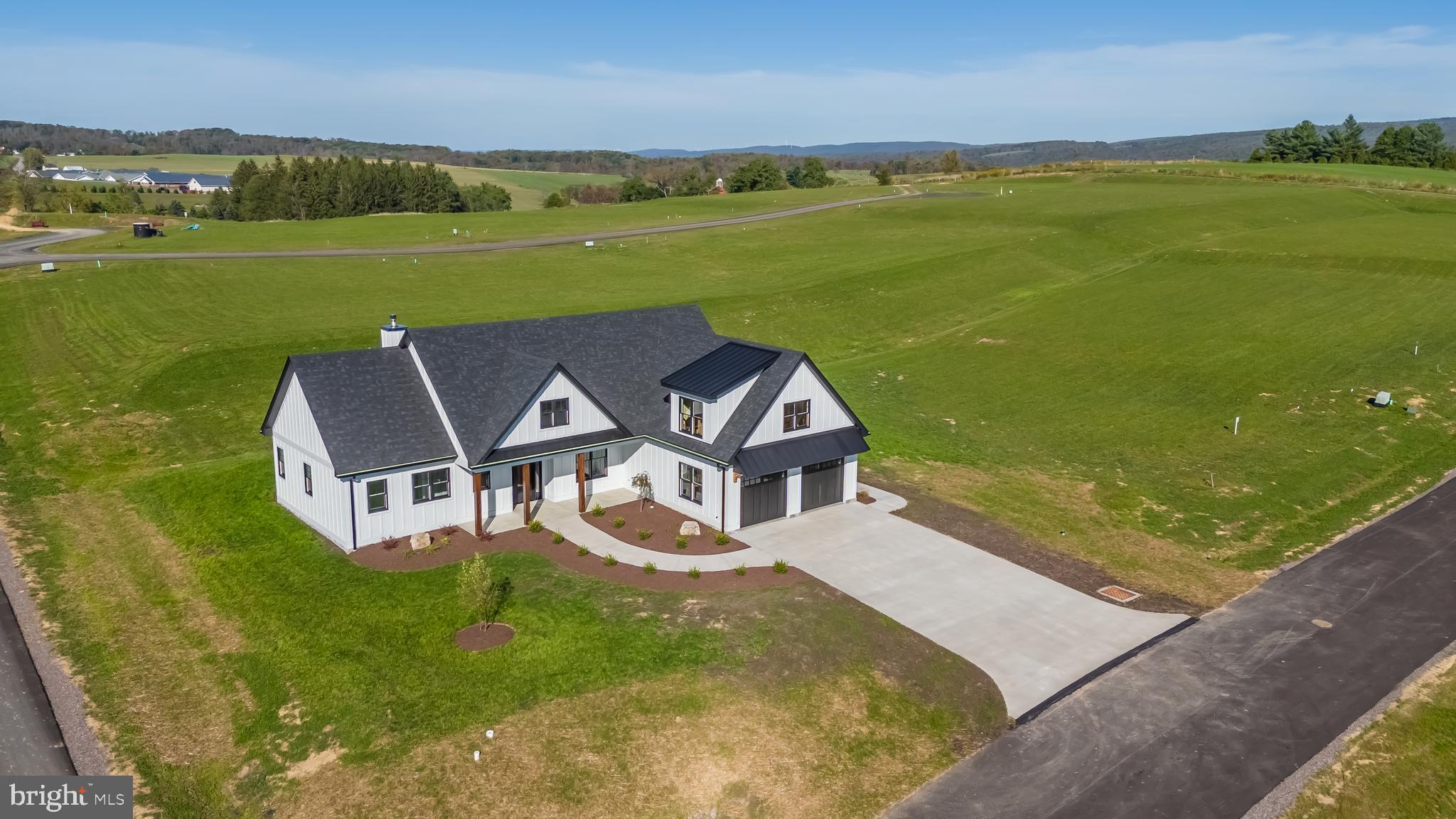 71 Walnut Ridge Grantsville, MD 21536 - Photo 8 of 55 an aerial view of a house with a yard lake view and mountain view