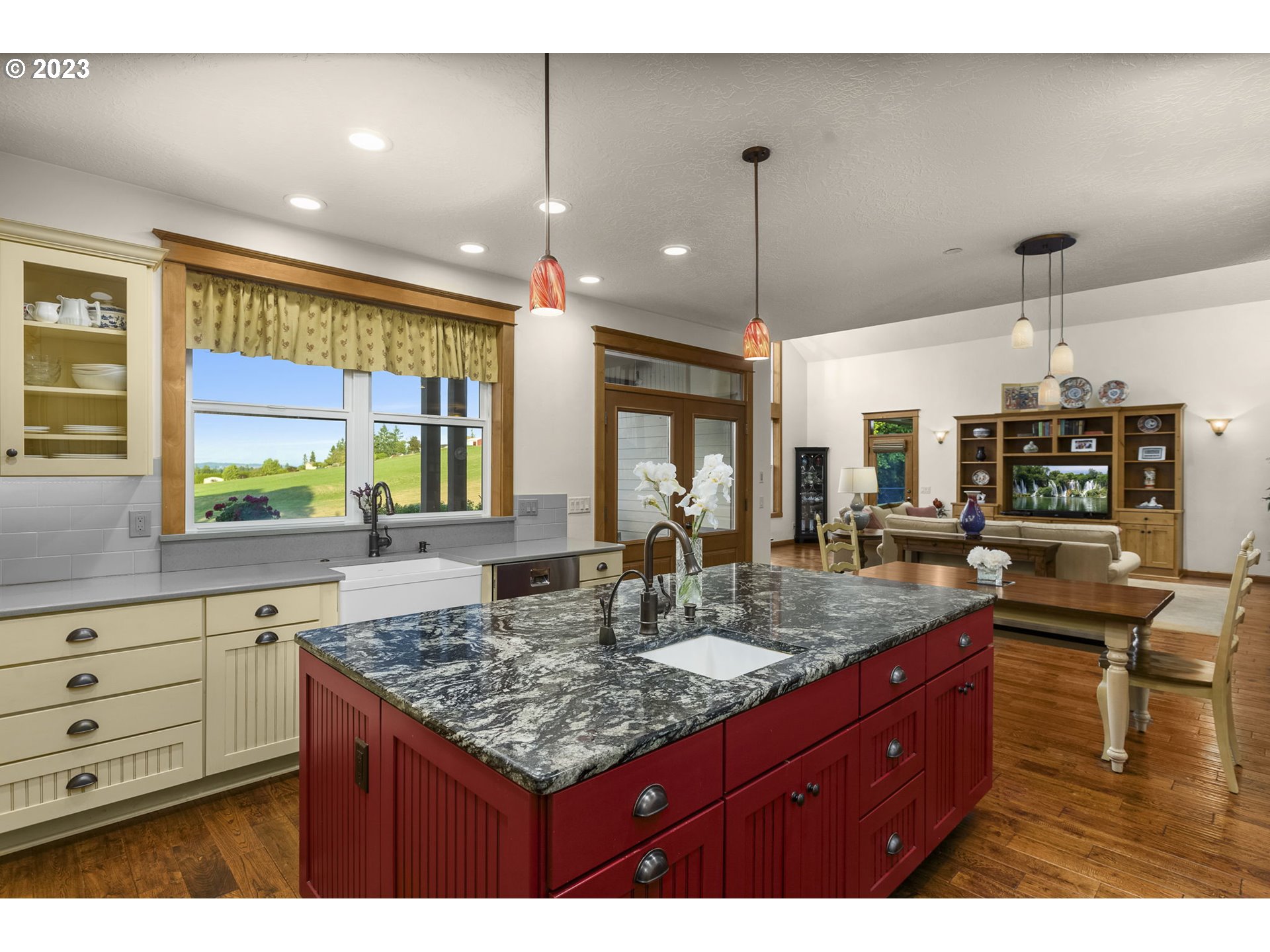 4185 Southwest Lafollett Road Cornelius, OR 97113 - Photo 12 of 45 a kitchen with center island and living room