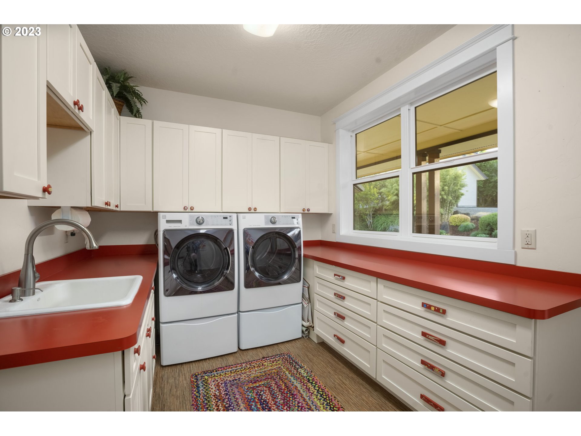4185 Southwest Lafollett Road Cornelius, OR 97113 - Photo 28 of 45 a utility room with sink dryer and washer