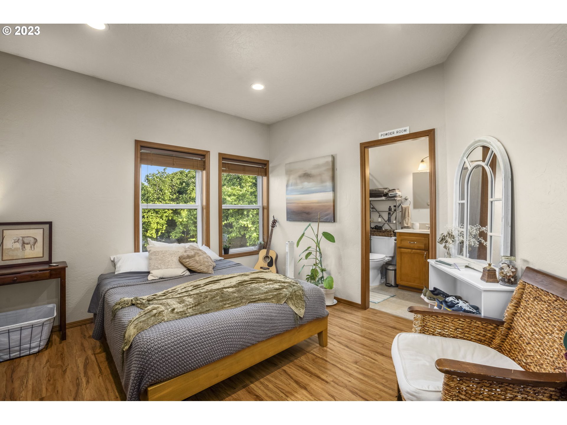 4185 Southwest Lafollett Road Cornelius, OR 97113 - Photo 42 of 45 a bedroom with a bed couch and a large window