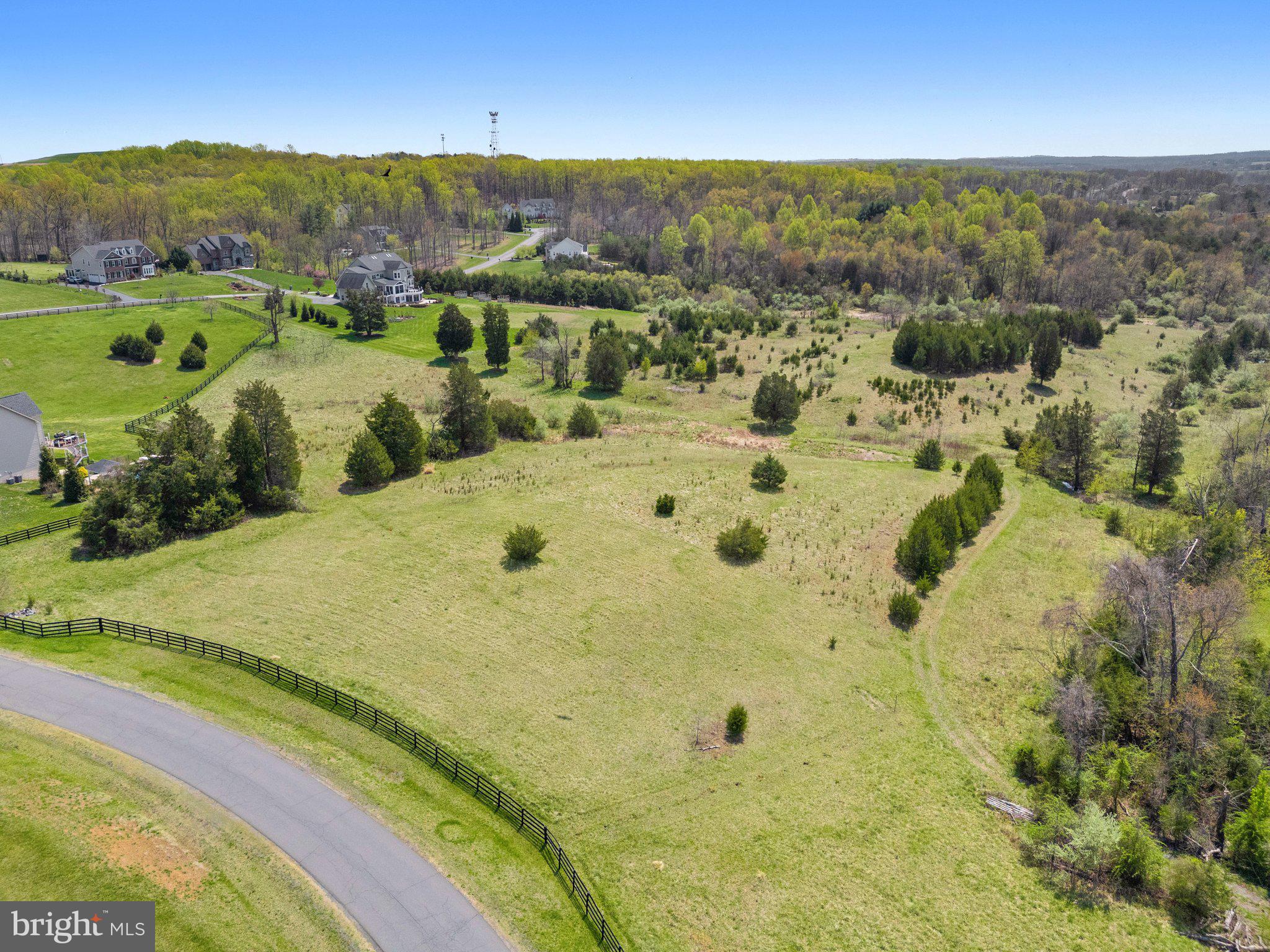 Lot 15 Stone Fox Court Leesburg, VA 20175 - Photo 3 of 8 a view of a swimming pool with a lake view