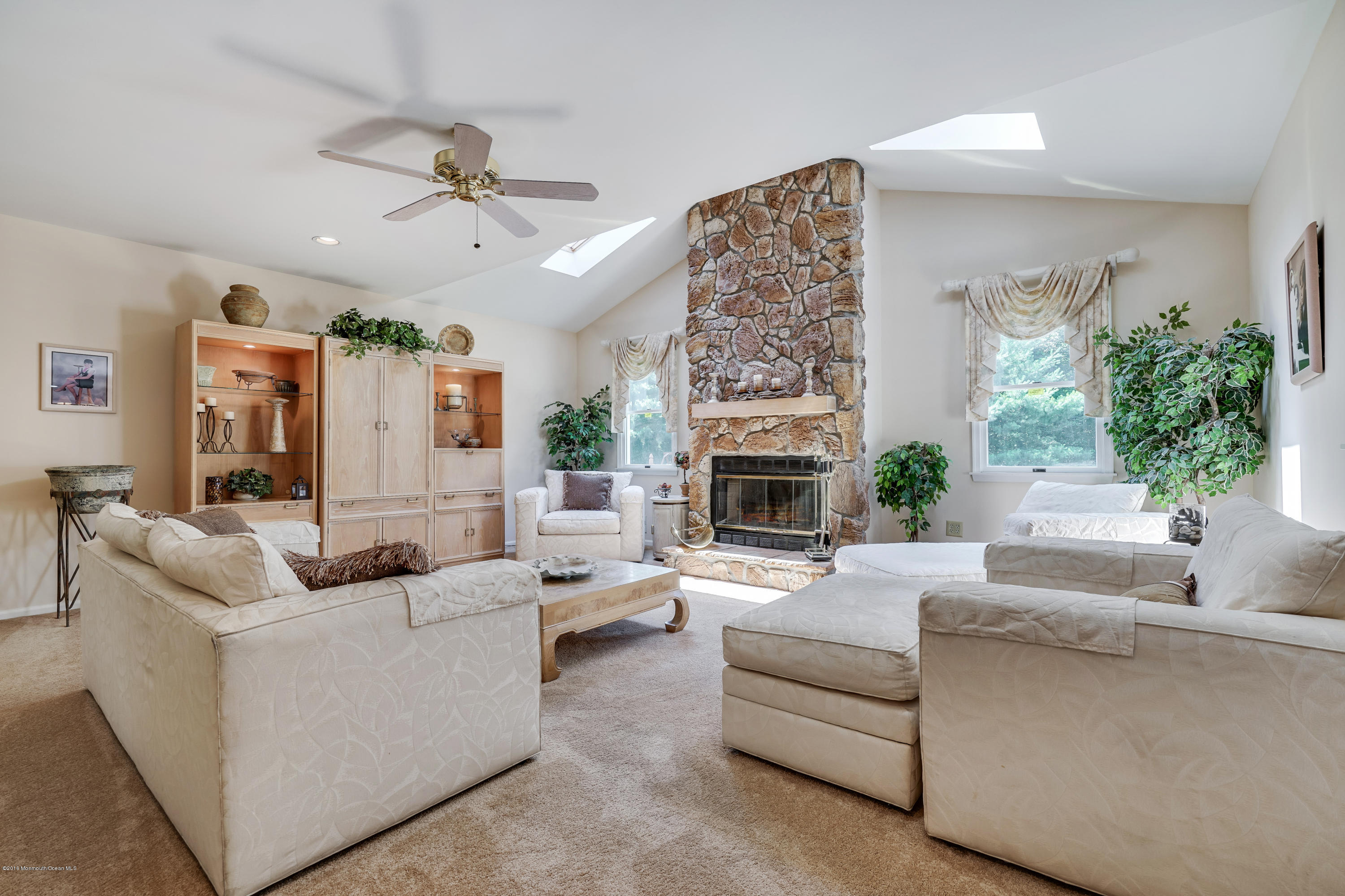 6 Overlook Drive Jackson, NJ 08527 - Photo 17 of 50 a living room with furniture and a fireplace