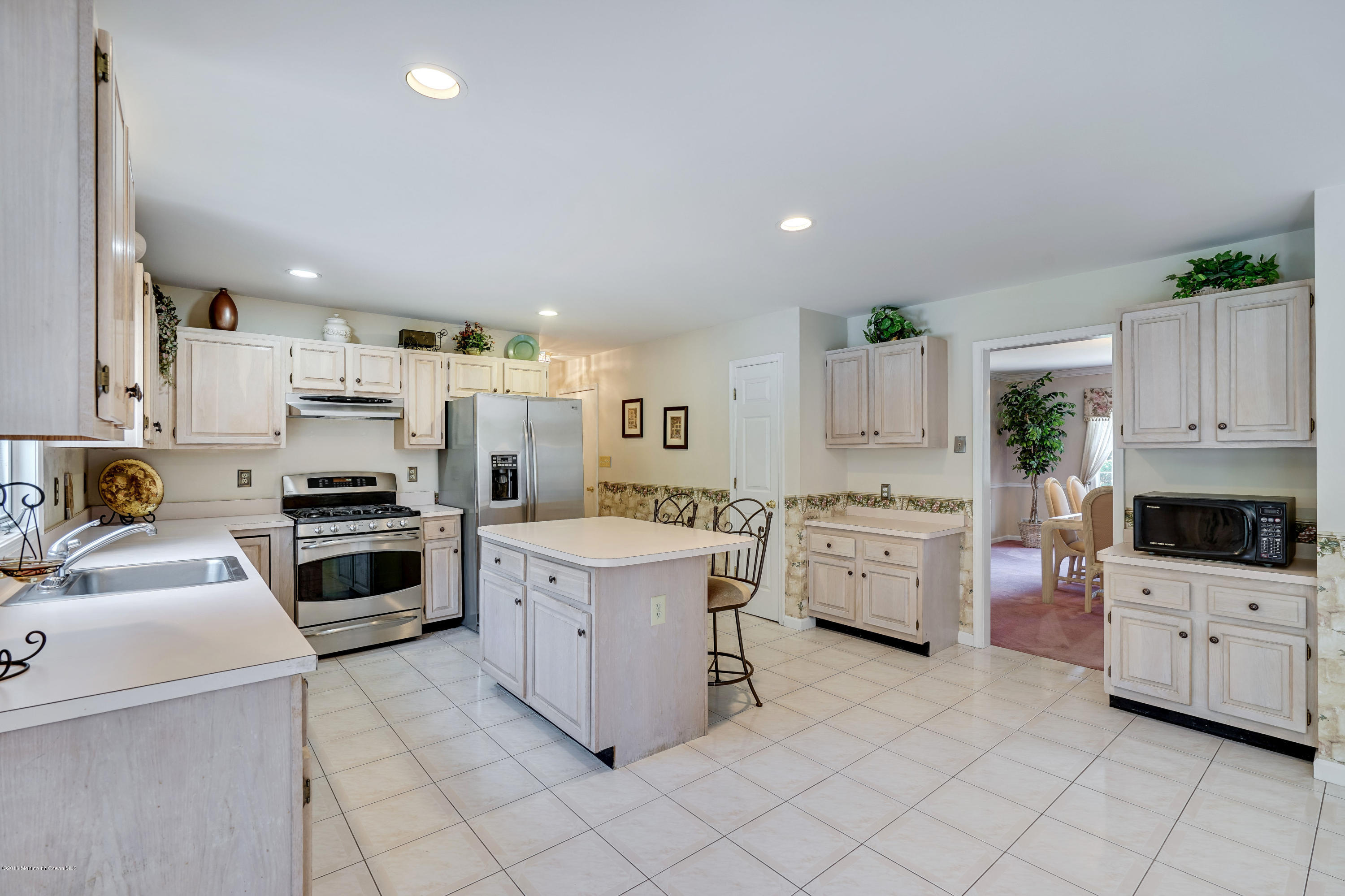 6 Overlook Drive Jackson, NJ 08527 - Photo 22 of 50 a kitchen that has a lot of white cabinets