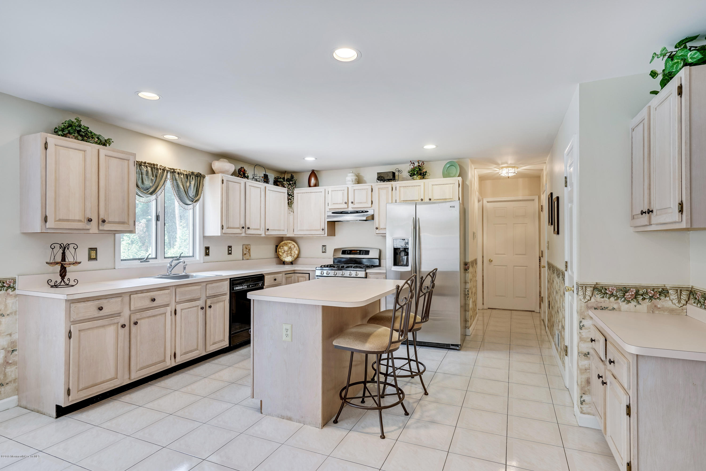 6 Overlook Drive Jackson, NJ 08527 - Photo 23 of 50 a kitchen with appliances cabinets and chairs