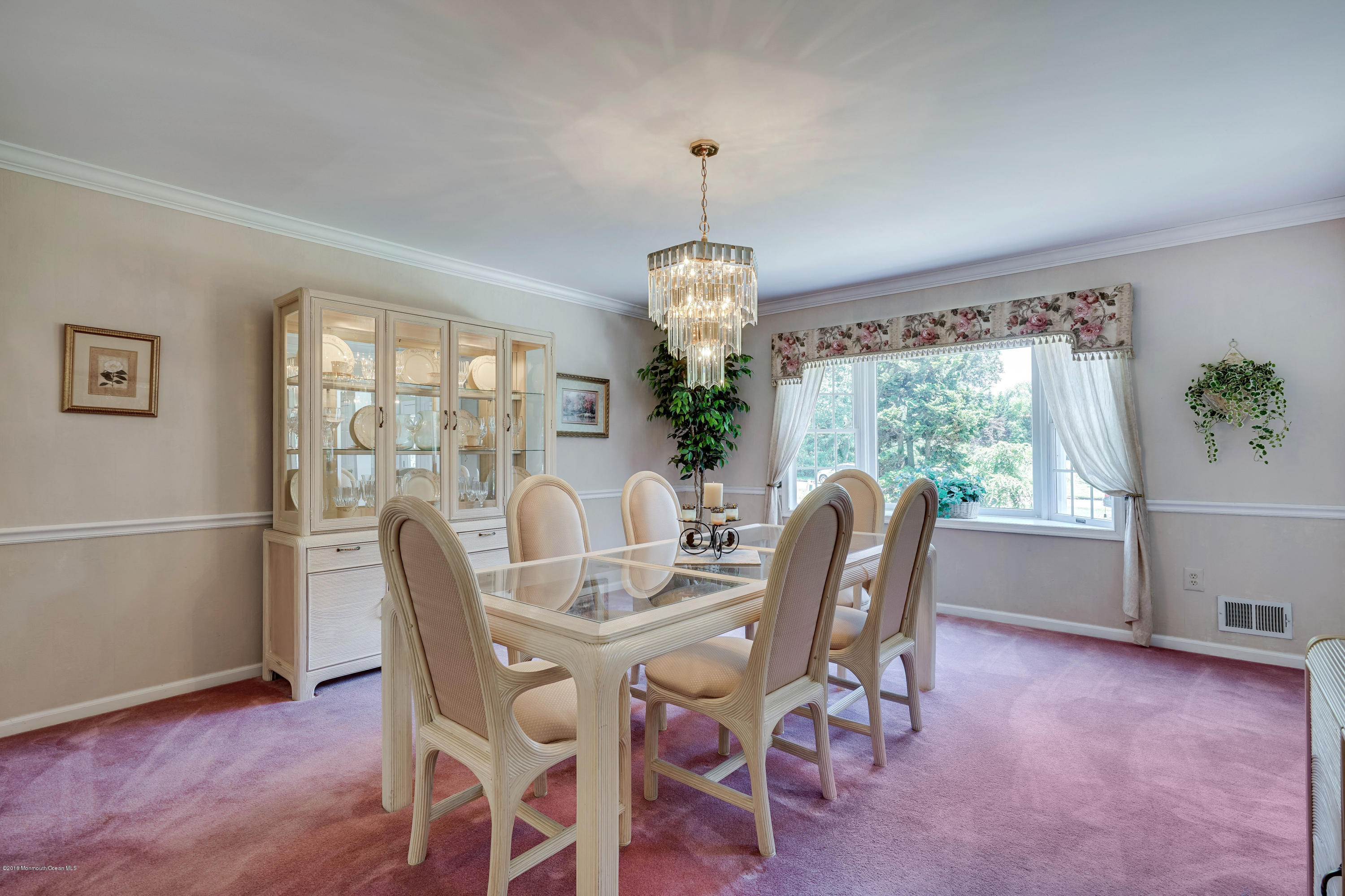 6 Overlook Drive Jackson, NJ 08527 - Photo 26 of 50 a dining room with furniture a chandelier and wooden floor