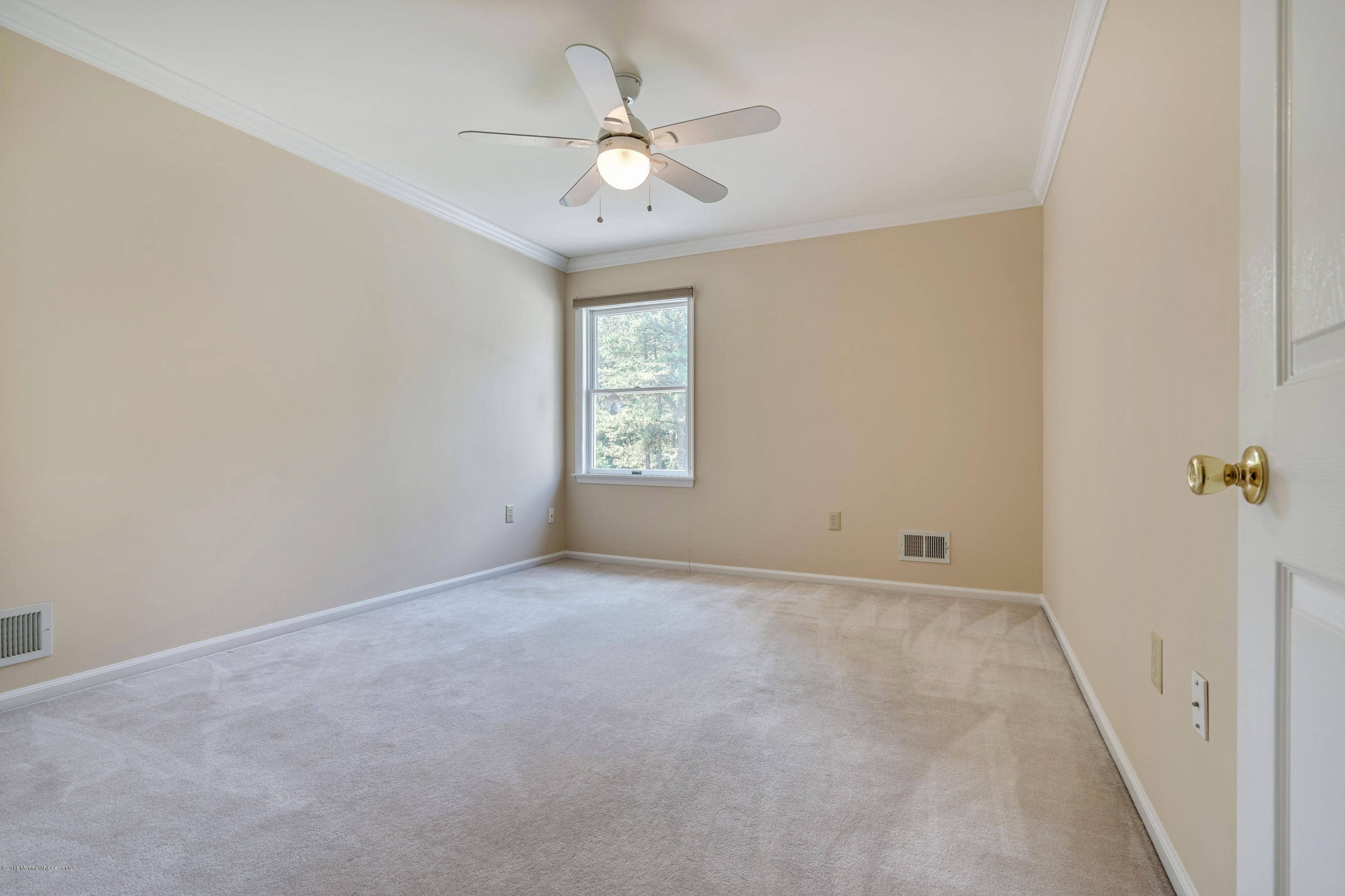 6 Overlook Drive Jackson, NJ 08527 - Photo 31 of 50 an empty room with windows and ceiling fan