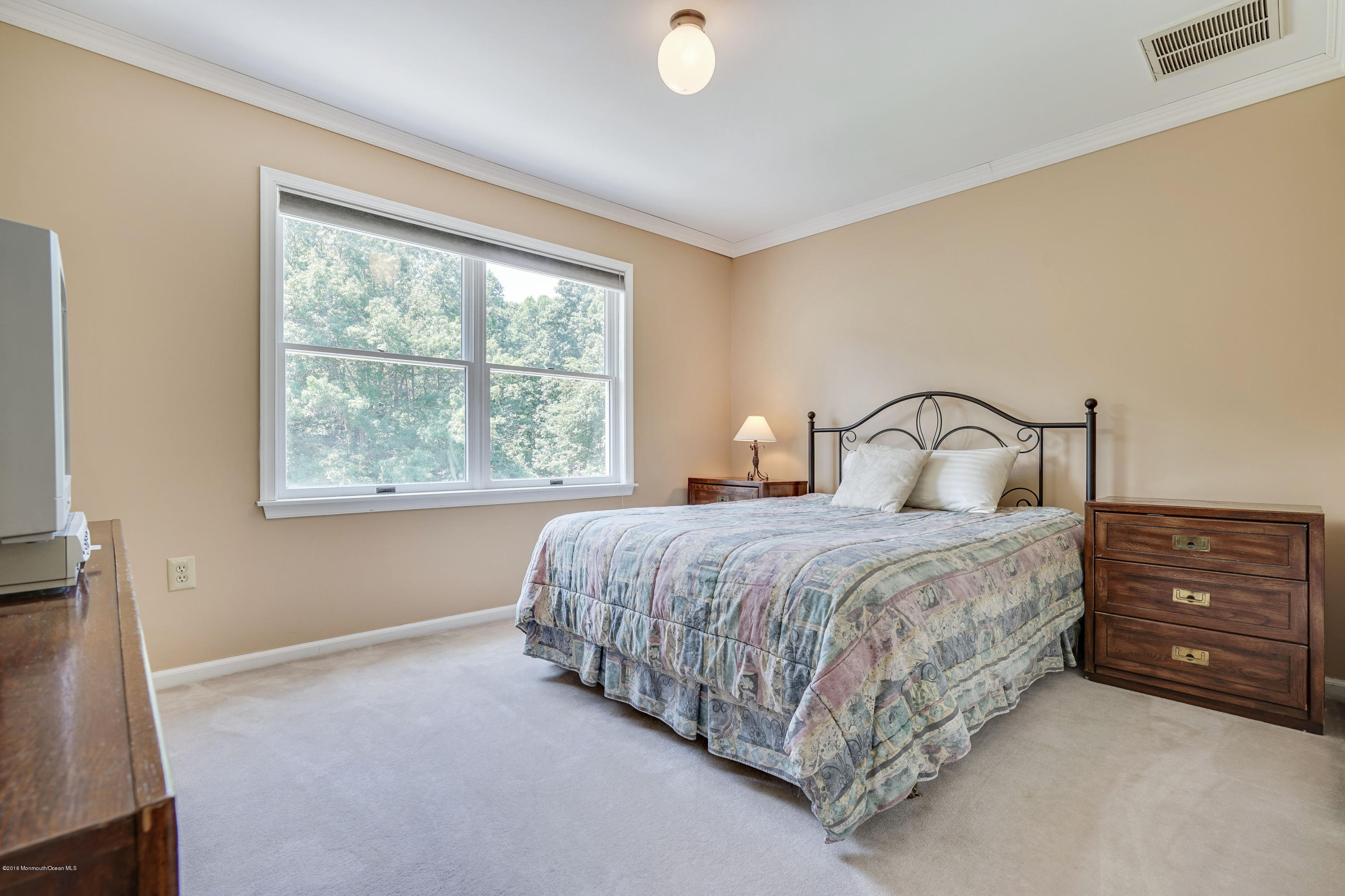 6 Overlook Drive Jackson, NJ 08527 - Photo 33 of 50 a bedroom with a bed and window