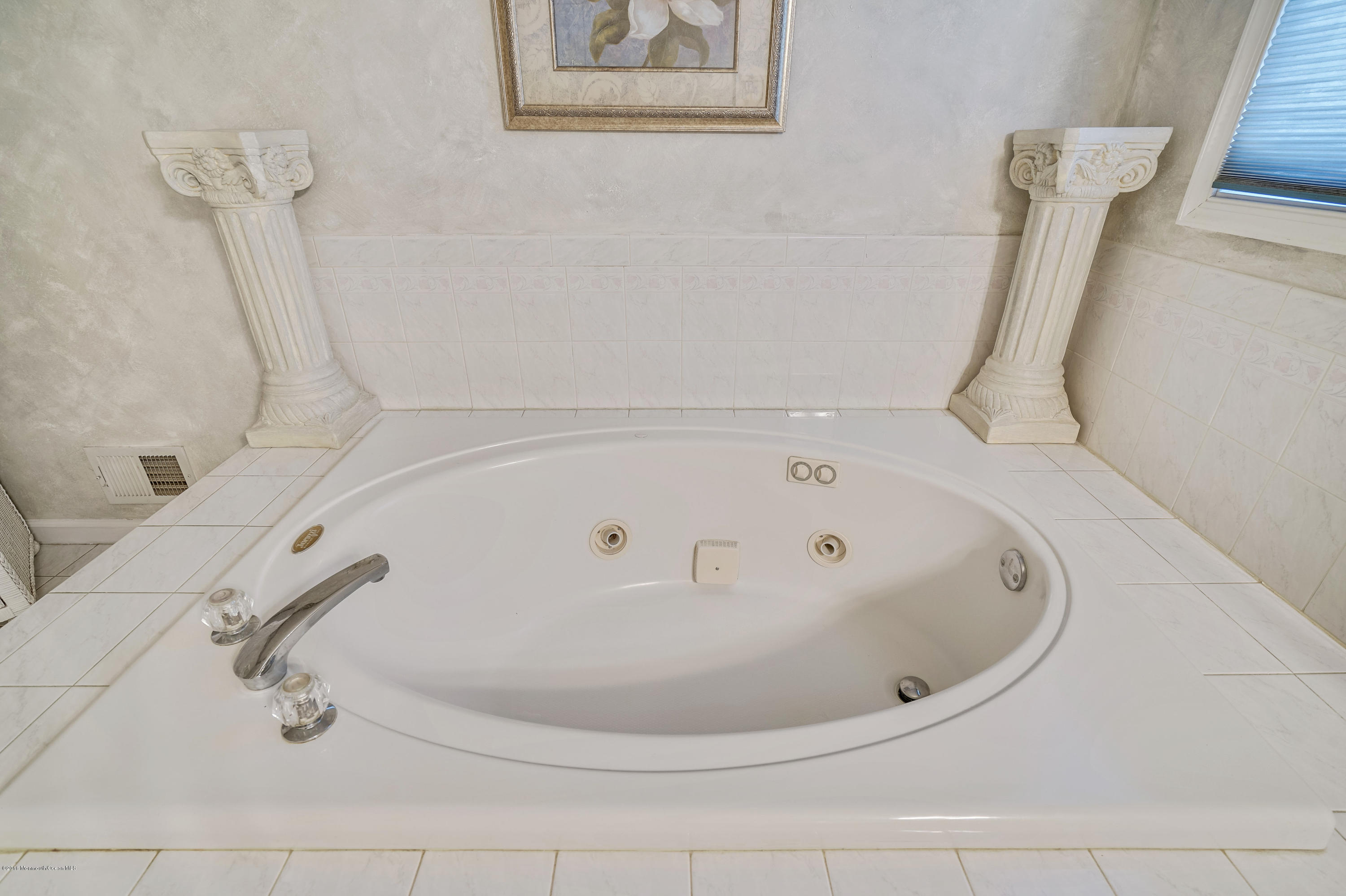 6 Overlook Drive Jackson, NJ 08527 - Photo 37 of 50 a white bath tub sitting in a bathroom