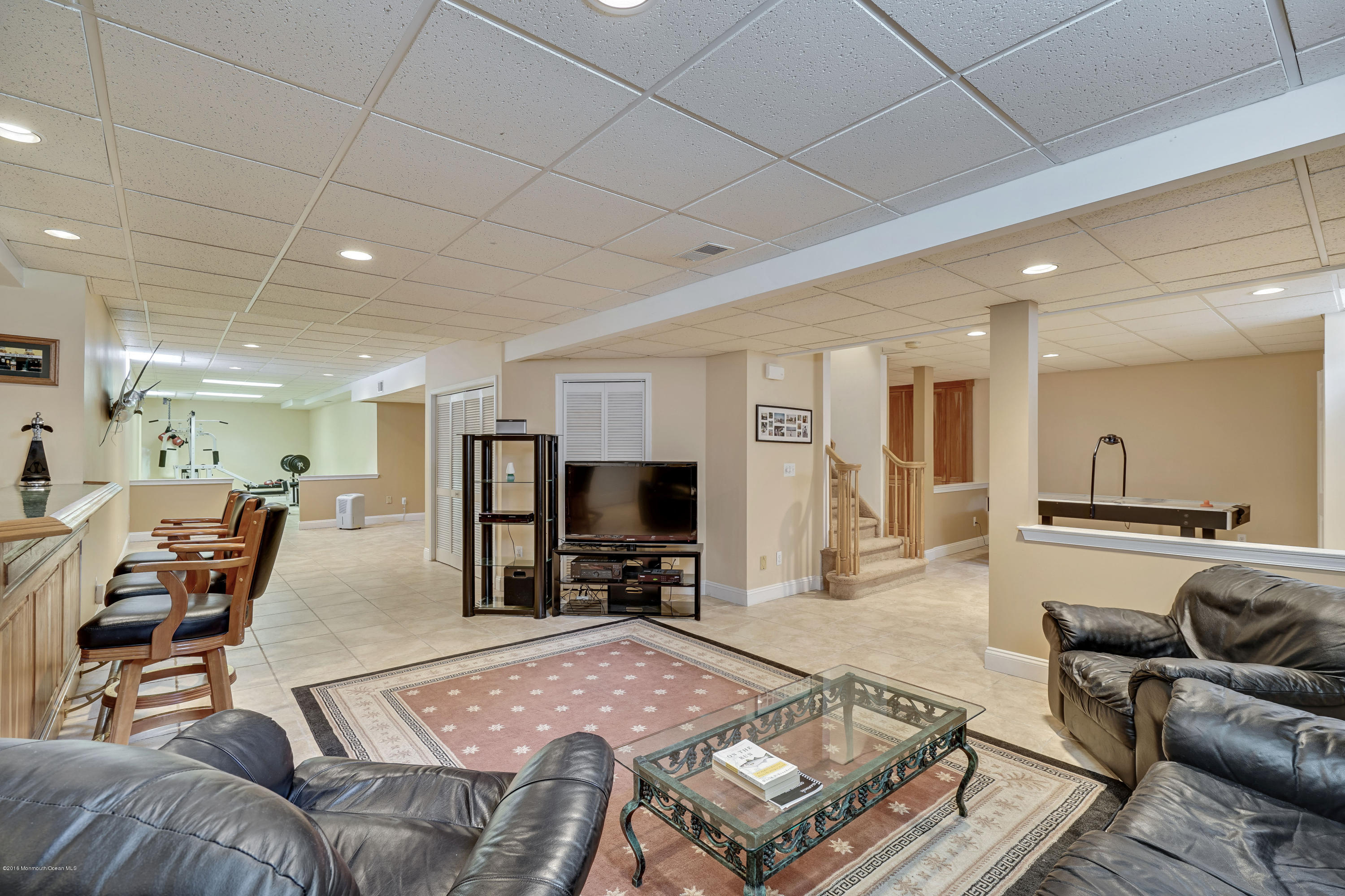 6 Overlook Drive Jackson, NJ 08527 - Photo 39 of 50 a living room with furniture and a flat screen tv
