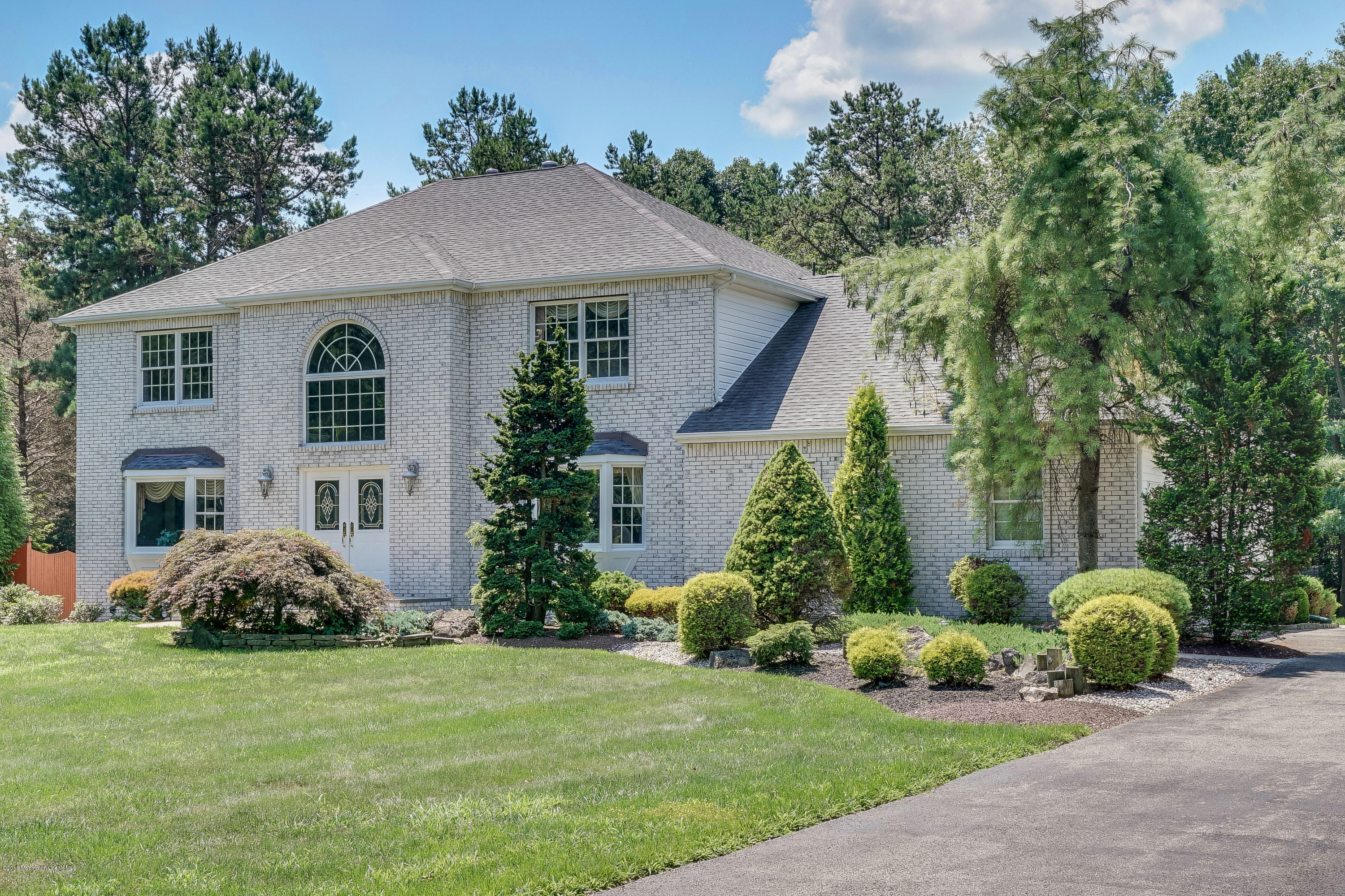 6 Overlook Drive Jackson, NJ 08527 - Photo 50 of 50 a front view of a house with a garden