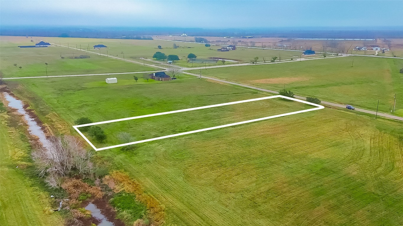 354 Brahman Trail Angleton, TX 77515 - Photo 3 of 6 a view of a tennis court