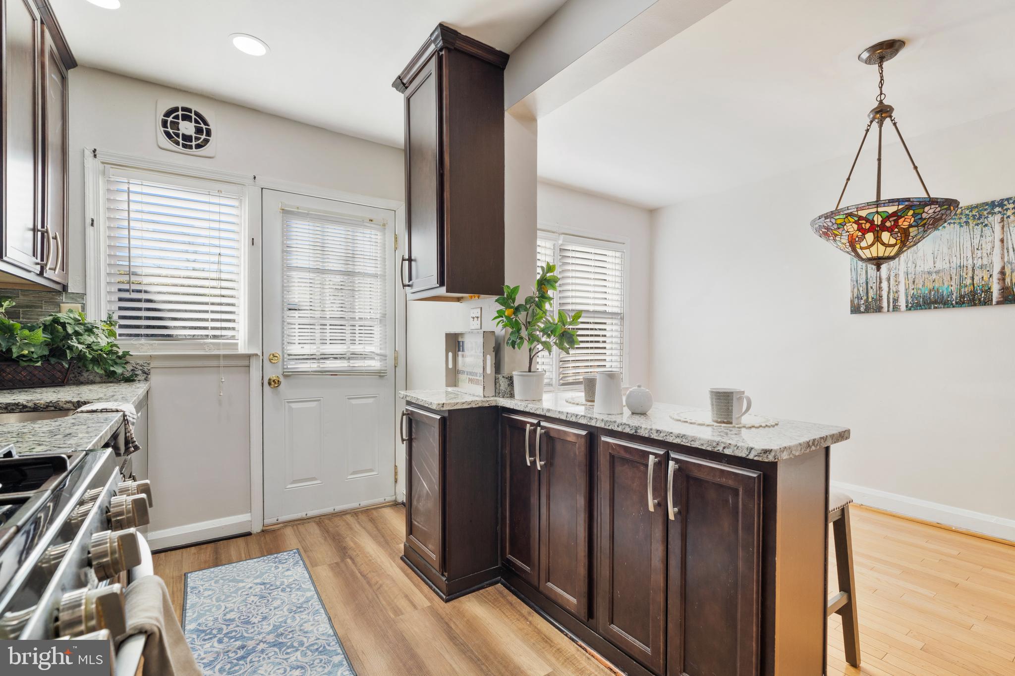 404 Grovethorn Road Baltimore, MD 21220 - Photo 13 of 39 a kitchen with a sink and a window