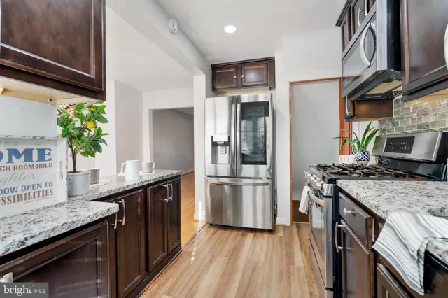 a kitchen with a stove and a kitchen