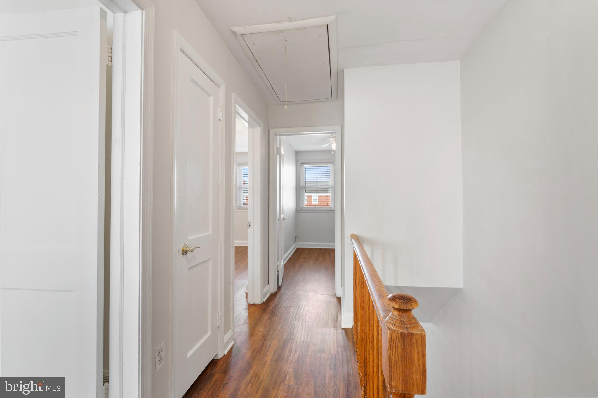 404 Grovethorn Road Baltimore, MD 21220 - Photo 16 of 39 a view of a hallway with wooden floor