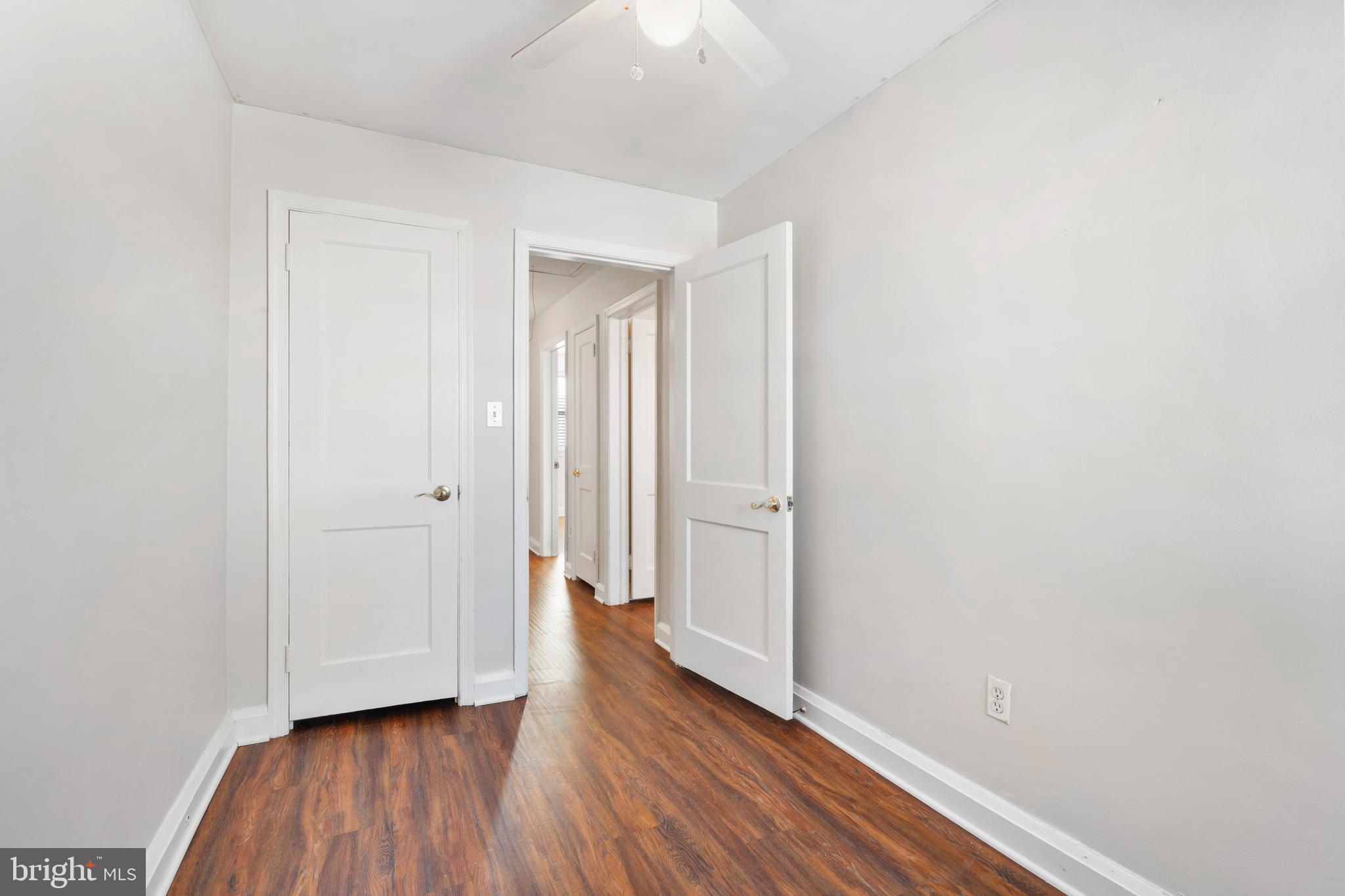 404 Grovethorn Road Baltimore, MD 21220 - Photo 18 of 39 a view of a hallway with wooden floor